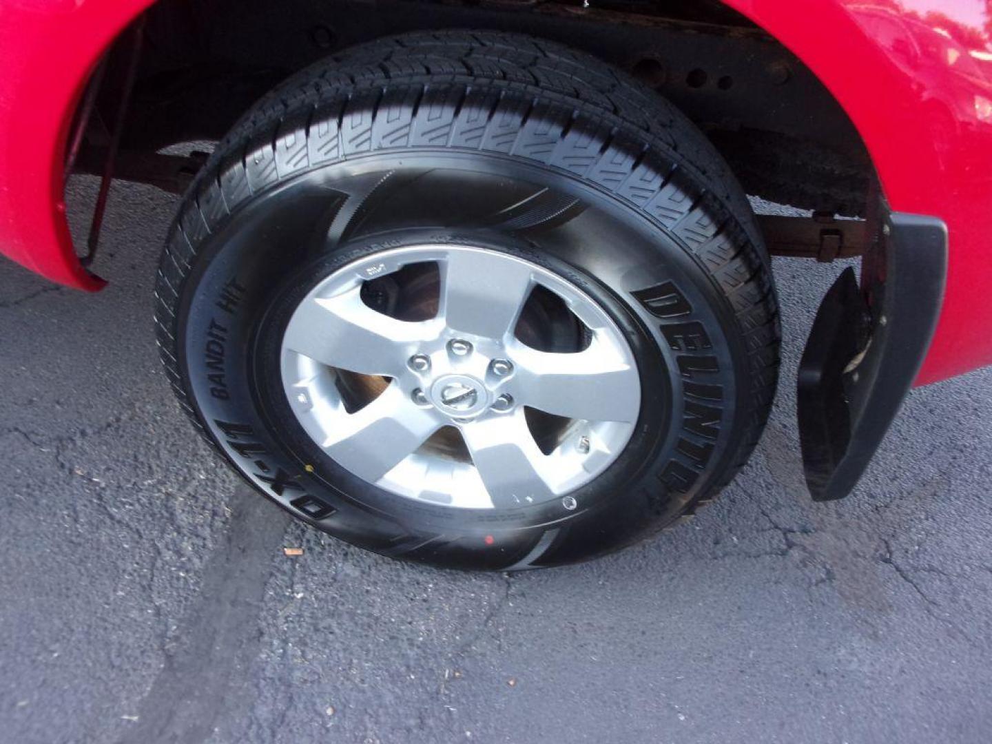 2010 RED NISSAN FRONTIER KING CAB SE (1N6AD0CW1AC) with an 4.0L engine, Automatic transmission, located at 501 E. Columbia St., Springfield, OH, 45503, (800) 262-7122, 39.925262, -83.801796 - *** New Tires *** 4x4 *** Serviced and Detailed *** King Cab *** SE *** 4.0L V6 *** 28 Service Records on Clean CarFax *** Jay North Auto has offered hand picked vehicles since 1965! Our customer's enjoy a NO pressure buying experience with a small town feel. All of our vehicles get fully inspe - Photo#15