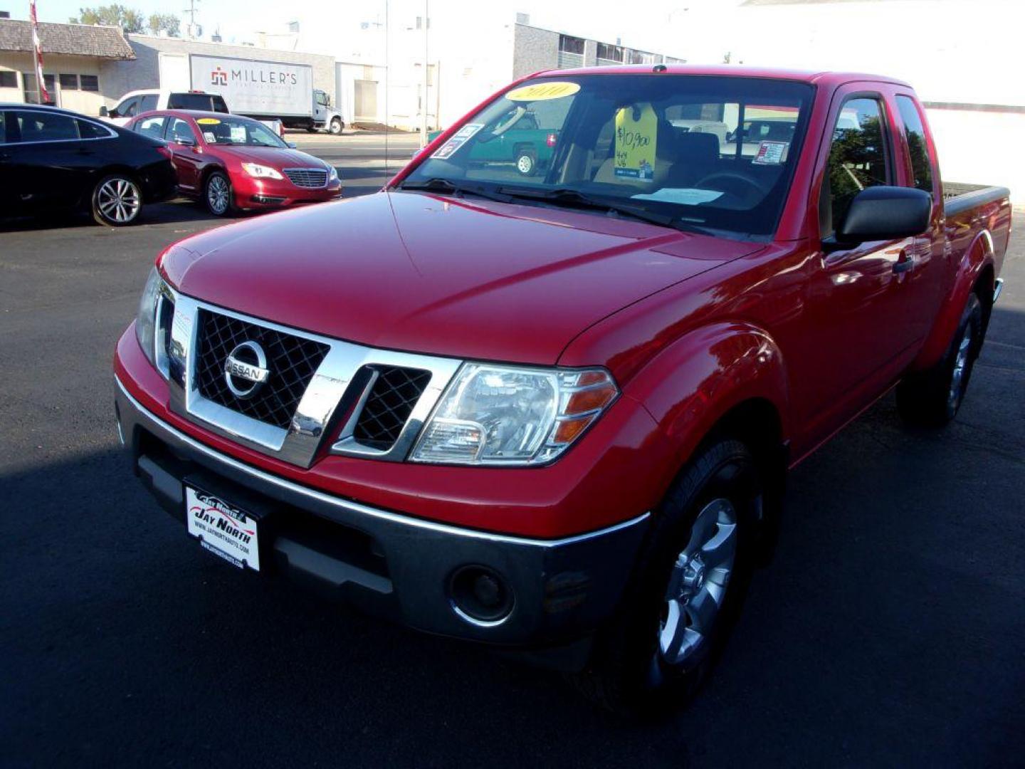 2010 RED NISSAN FRONTIER KING CAB SE (1N6AD0CW1AC) with an 4.0L engine, Automatic transmission, located at 501 E. Columbia St., Springfield, OH, 45503, (800) 262-7122, 39.925262, -83.801796 - *** New Tires *** 4x4 *** Serviced and Detailed *** King Cab *** SE *** 4.0L V6 *** 28 Service Records on Clean CarFax *** Jay North Auto has offered hand picked vehicles since 1965! Our customer's enjoy a NO pressure buying experience with a small town feel. All of our vehicles get fully inspe - Photo#3