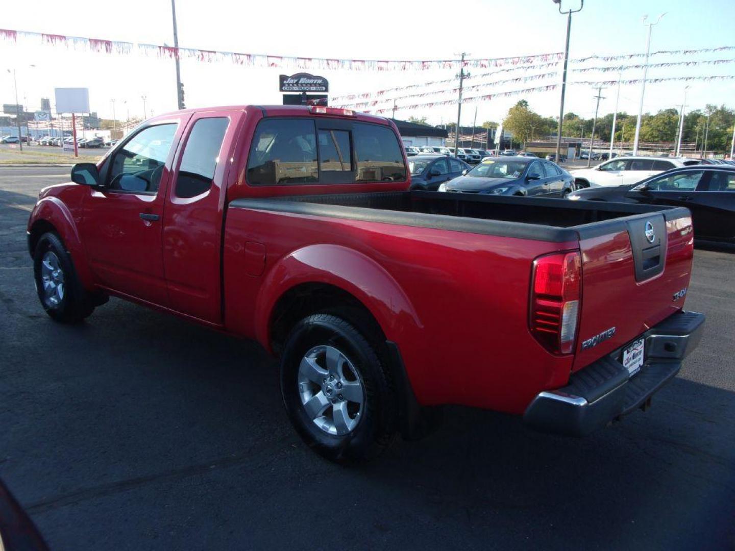 2010 RED NISSAN FRONTIER KING CAB SE (1N6AD0CW1AC) with an 4.0L engine, Automatic transmission, located at 501 E. Columbia St., Springfield, OH, 45503, (800) 262-7122, 39.925262, -83.801796 - *** New Tires *** 4x4 *** Serviced and Detailed *** King Cab *** SE *** 4.0L V6 *** 28 Service Records on Clean CarFax *** Jay North Auto has offered hand picked vehicles since 1965! Our customer's enjoy a NO pressure buying experience with a small town feel. All of our vehicles get fully inspe - Photo#4