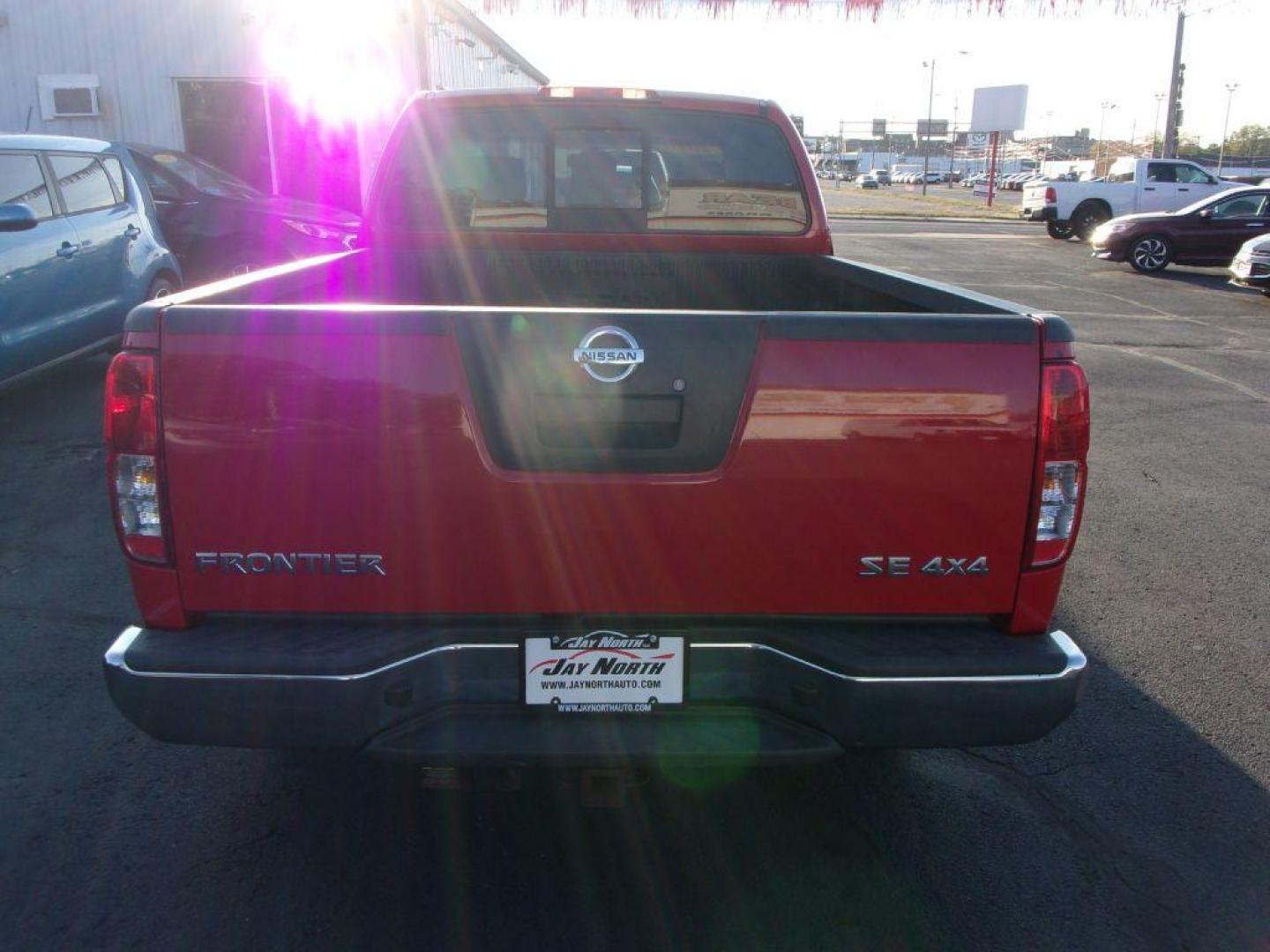 2010 RED NISSAN FRONTIER KING CAB SE (1N6AD0CW1AC) with an 4.0L engine, Automatic transmission, located at 501 E. Columbia St., Springfield, OH, 45503, (800) 262-7122, 39.925262, -83.801796 - *** New Tires *** 4x4 *** Serviced and Detailed *** King Cab *** SE *** 4.0L V6 *** 28 Service Records on Clean CarFax *** Jay North Auto has offered hand picked vehicles since 1965! Our customer's enjoy a NO pressure buying experience with a small town feel. All of our vehicles get fully inspe - Photo#5