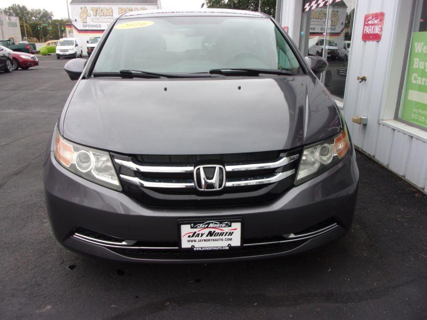 2016 GRAY HONDA ODYSSEY EX (5FNRL5H42GB) with an 3.5L engine, Automatic transmission, located at 501 E. Columbia St., Springfield, OH, 45503, (800) 262-7122, 39.925262, -83.801796 - ***Timing Belt Replaced at 71K Miles***New Tires***EX***Power Sliding Doors***Serviced and Detailed*** Jay North Auto has offered hand picked vehicles since 1965! Our customer's enjoy a NO pressure buying experience with a small town feel. All of our vehicles get fully inspected and detailed. We - Photo#1