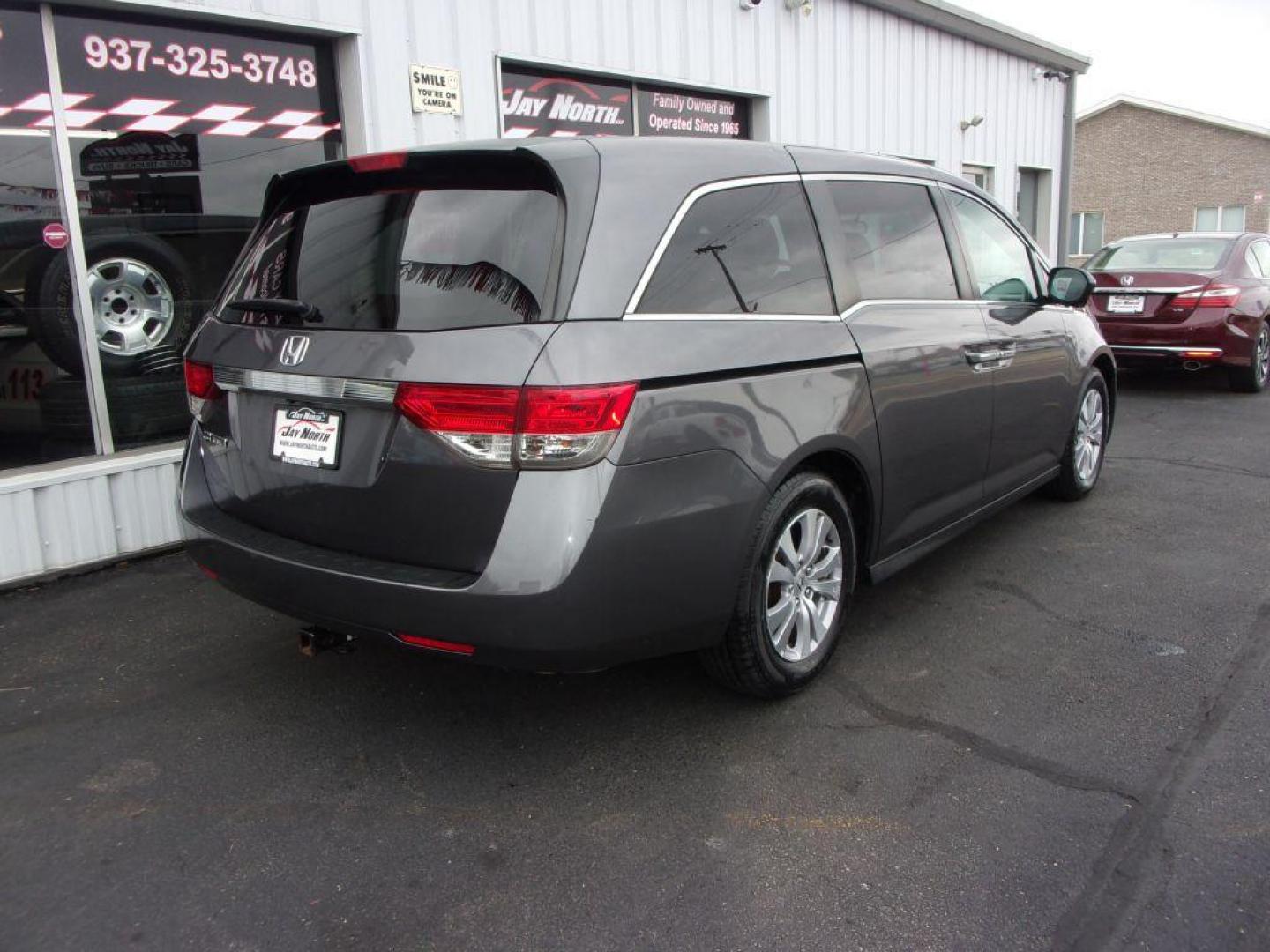 2016 GRAY HONDA ODYSSEY EX (5FNRL5H42GB) with an 3.5L engine, Automatic transmission, located at 501 E. Columbia St., Springfield, OH, 45503, (800) 262-7122, 39.925262, -83.801796 - ***Timing Belt Replaced at 71K Miles***New Tires***EX***Power Sliding Doors***Serviced and Detailed*** Jay North Auto has offered hand picked vehicles since 1965! Our customer's enjoy a NO pressure buying experience with a small town feel. All of our vehicles get fully inspected and detailed. We - Photo#3