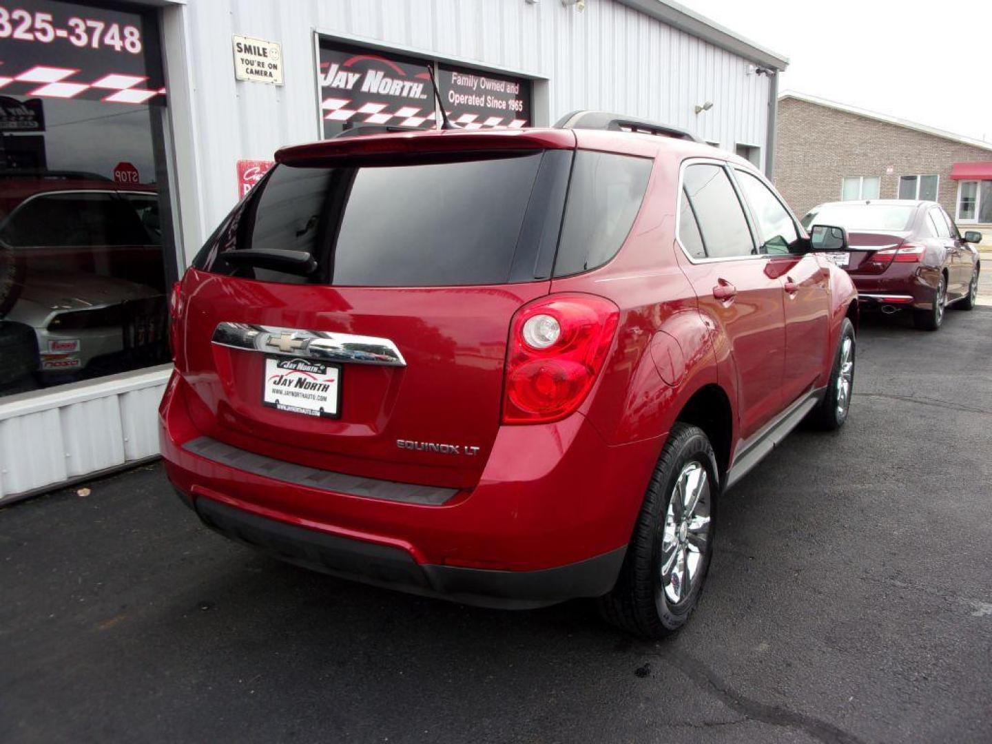 2014 RED CHEVROLET EQUINOX 2LT (1GNALCEKXEZ) with an 2.4L engine, Automatic transmission, located at 501 E. Columbia St., Springfield, OH, 45503, (800) 262-7122, 39.925262, -83.801796 - ***Clean Carfax***New Tires***2LT***Heated Leather Seating***Moon Roof***Serviced and Detailed*** Jay North Auto has offered hand picked vehicles since 1965! Our customer's enjoy a NO pressure buying experience with a small town feel. All of our vehicles get fully inspected and detailed. We are - Photo#3