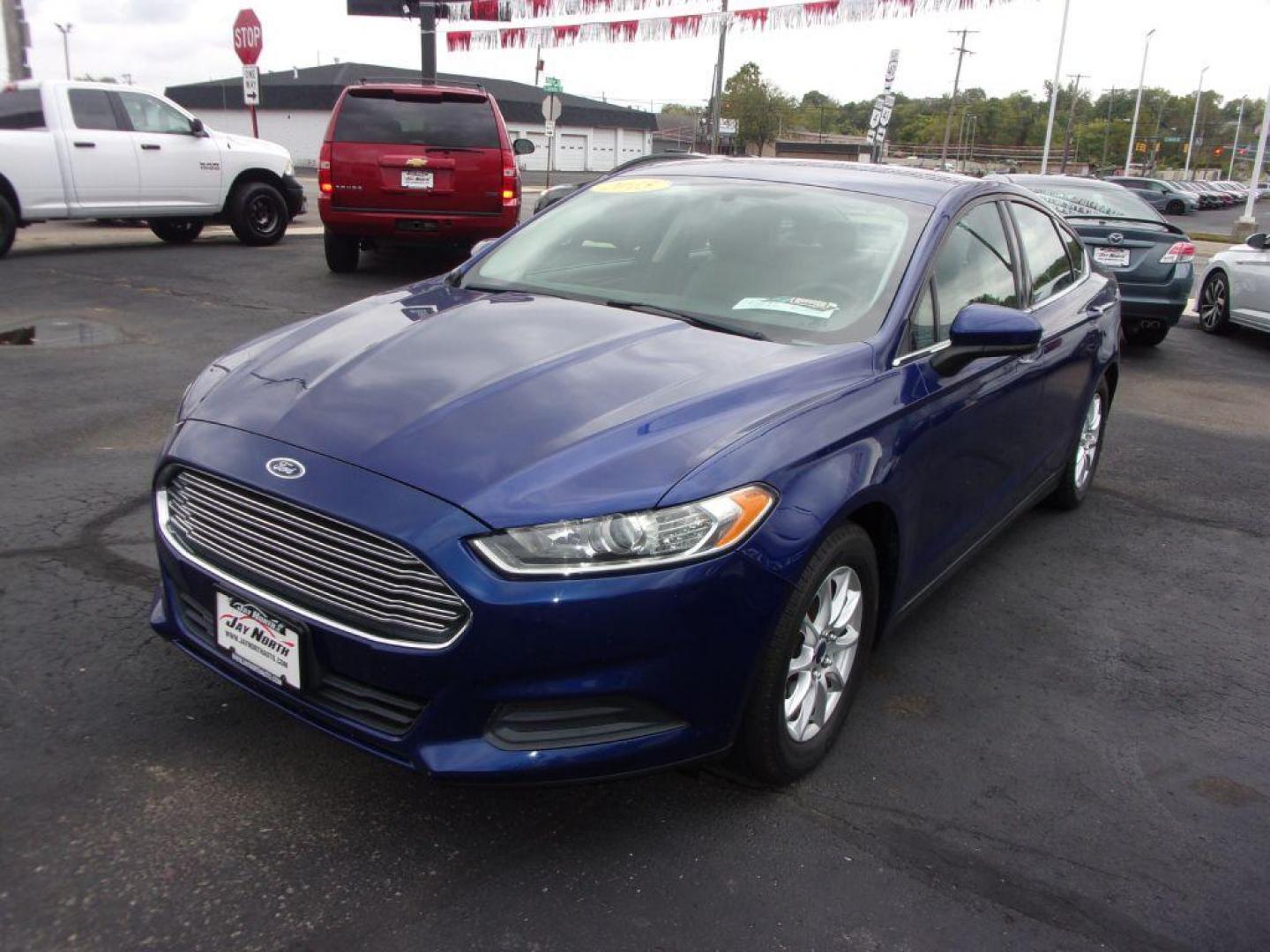 2015 BLUE FORD FUSION S (3FA6P0G74FR) with an 2.5L engine, Automatic transmission, located at 501 E. Columbia St., Springfield, OH, 45503, (800) 262-7122, 39.925262, -83.801796 - *** Serviced and Detailed *** Back Up Camera *** S *** FWD *** Jay North Auto has offered hand picked vehicles since 1965! Our customer's enjoy a NO pressure buying experience with a small town feel. All of our vehicles get fully inspected and detailed. We are a preferred dealer for many local c - Photo#3