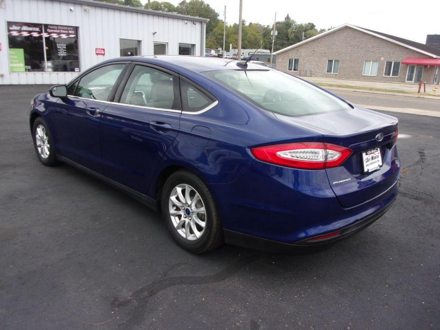 2015 BLUE FORD FUSION S (3FA6P0G74FR) with an 2.5L engine, Automatic transmission, located at 501 E. Columbia St., Springfield, OH, 45503, (800) 262-7122, 39.925262, -83.801796 - *** Serviced and Detailed *** Back Up Camera *** S *** FWD *** Jay North Auto has offered hand picked vehicles since 1965! Our customer's enjoy a NO pressure buying experience with a small town feel. All of our vehicles get fully inspected and detailed. We are a preferred dealer for many local c - Photo#4