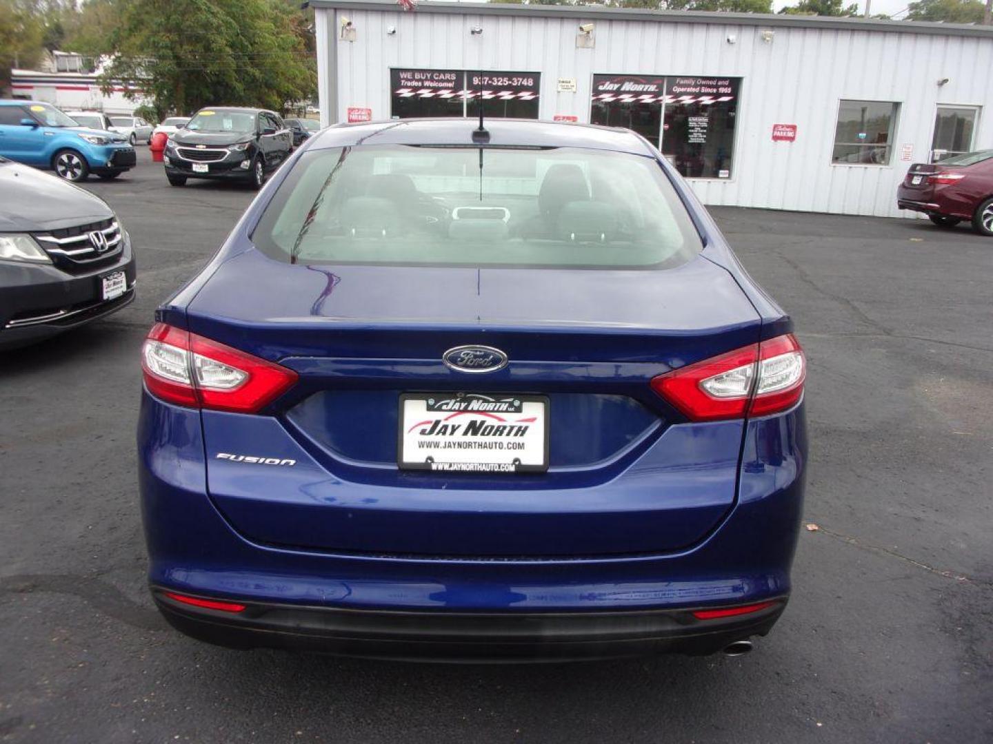 2015 BLUE FORD FUSION S (3FA6P0G74FR) with an 2.5L engine, Automatic transmission, located at 501 E. Columbia St., Springfield, OH, 45503, (800) 262-7122, 39.925262, -83.801796 - *** Serviced and Detailed *** Back Up Camera *** S *** FWD *** Jay North Auto has offered hand picked vehicles since 1965! Our customer's enjoy a NO pressure buying experience with a small town feel. All of our vehicles get fully inspected and detailed. We are a preferred dealer for many local c - Photo#5