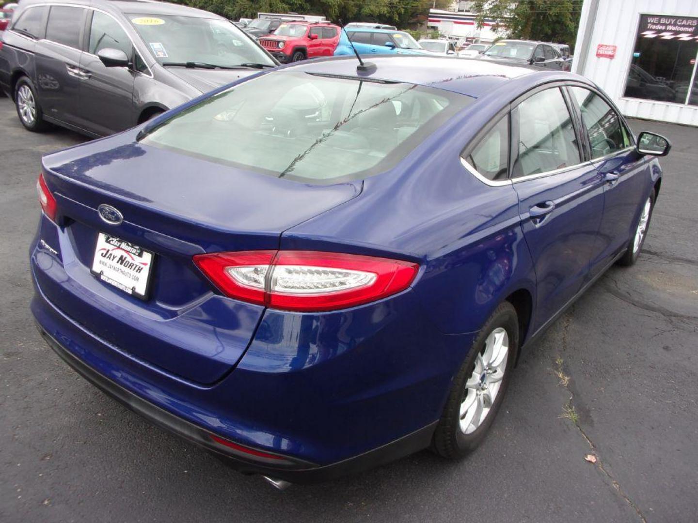 2015 BLUE FORD FUSION S (3FA6P0G74FR) with an 2.5L engine, Automatic transmission, located at 501 E. Columbia St., Springfield, OH, 45503, (800) 262-7122, 39.925262, -83.801796 - *** Serviced and Detailed *** Back Up Camera *** S *** FWD *** Jay North Auto has offered hand picked vehicles since 1965! Our customer's enjoy a NO pressure buying experience with a small town feel. All of our vehicles get fully inspected and detailed. We are a preferred dealer for many local c - Photo#6