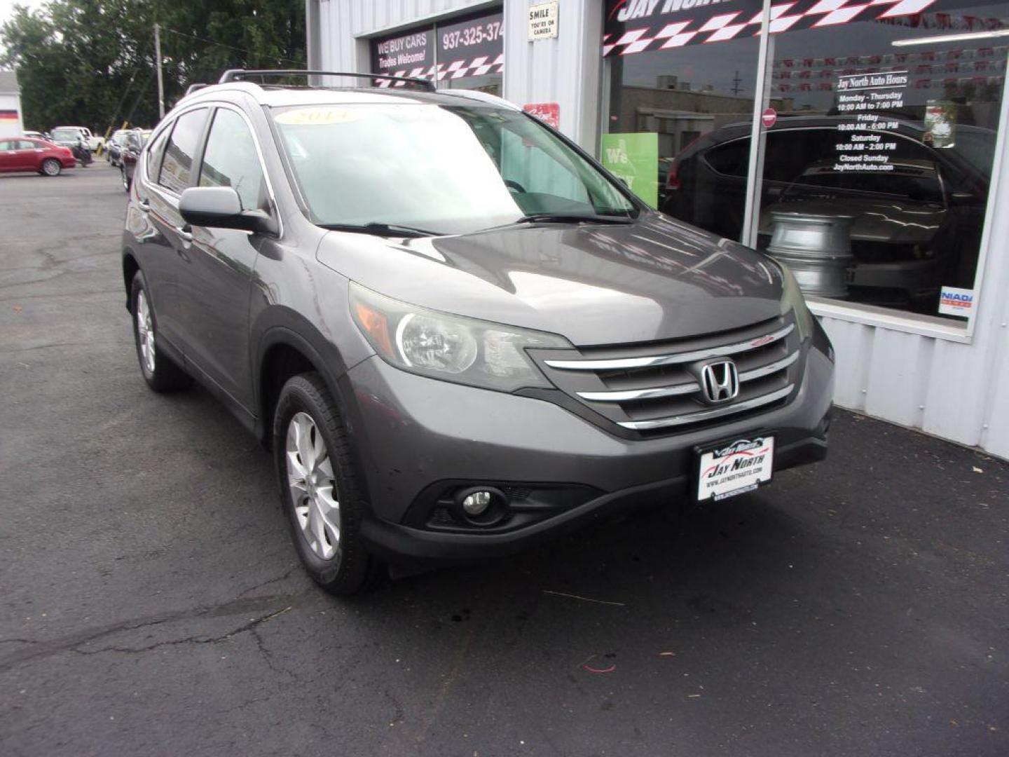 2014 GRAY HONDA CR-V EXL (2HKRM4H7XEH) with an 2.4L engine, Automatic transmission, located at 501 E. Columbia St., Springfield, OH, 45503, (800) 262-7122, 39.925262, -83.801796 - ***Clean Carfax***EXL***Heated Leather Seating***Moonroof***AWD***Serviced and Detailed*** Jay North Auto has offered hand picked vehicles since 1965! Our customer's enjoy a NO pressure buying experience with a small town feel. All of our vehicles get fully inspected and detailed. We are a pre - Photo#2