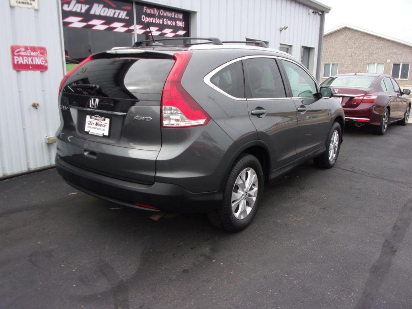 2014 GRAY HONDA CR-V EXL (2HKRM4H7XEH) with an 2.4L engine, Automatic transmission, located at 501 E. Columbia St., Springfield, OH, 45503, (800) 262-7122, 39.925262, -83.801796 - ***Clean Carfax***EXL***Heated Leather Seating***Moonroof***AWD***Serviced and Detailed*** Jay North Auto has offered hand picked vehicles since 1965! Our customer's enjoy a NO pressure buying experience with a small town feel. All of our vehicles get fully inspected and detailed. We are a pre - Photo#3