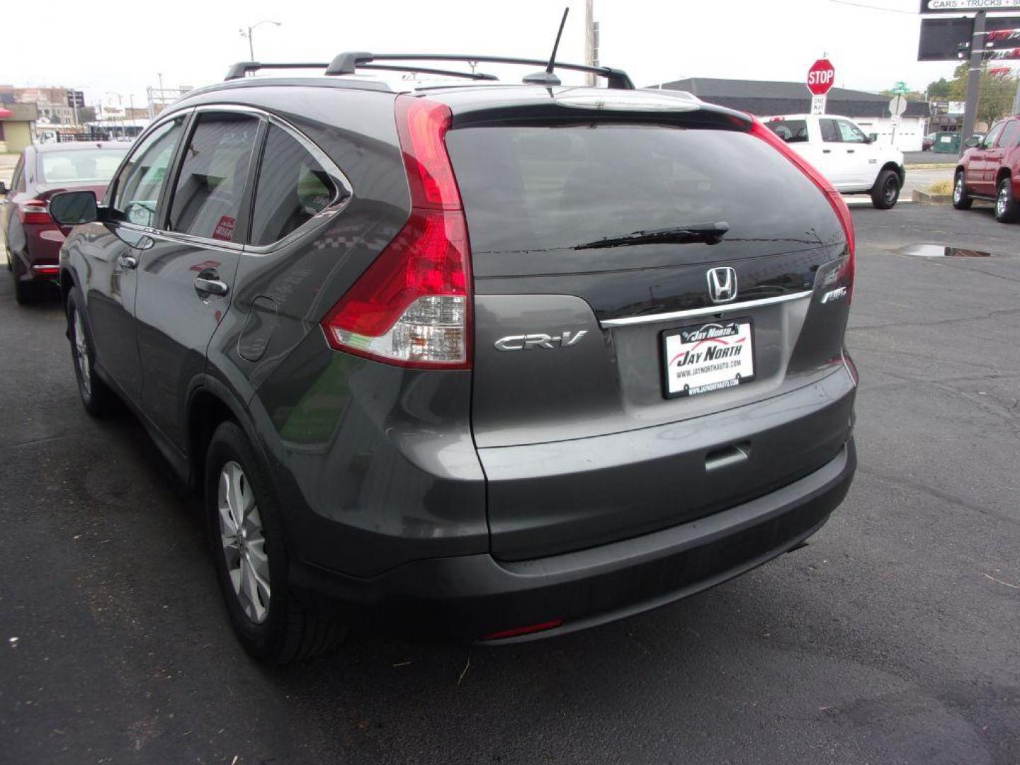 2014 GRAY HONDA CR-V EXL (2HKRM4H7XEH) with an 2.4L engine, Automatic transmission, located at 501 E. Columbia St., Springfield, OH, 45503, (800) 262-7122, 39.925262, -83.801796 - ***Clean Carfax***EXL***Heated Leather Seating***Moonroof***AWD***Serviced and Detailed*** Jay North Auto has offered hand picked vehicles since 1965! Our customer's enjoy a NO pressure buying experience with a small town feel. All of our vehicles get fully inspected and detailed. We are a pre - Photo#5