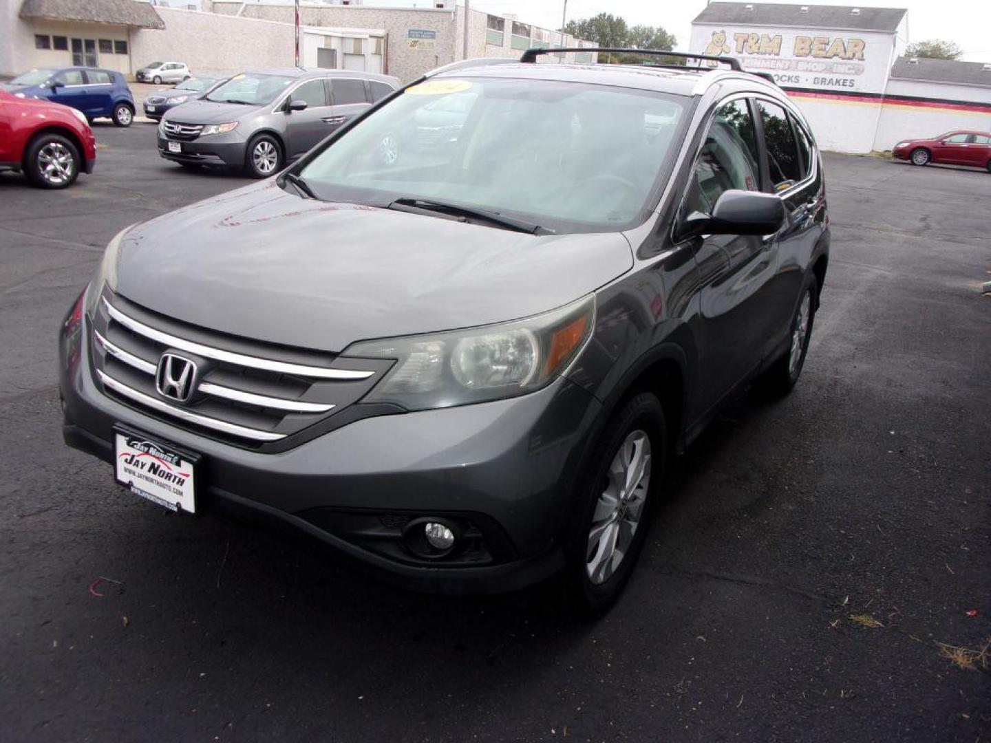 2014 GRAY HONDA CR-V EXL (2HKRM4H7XEH) with an 2.4L engine, Automatic transmission, located at 501 E. Columbia St., Springfield, OH, 45503, (800) 262-7122, 39.925262, -83.801796 - ***Clean Carfax***EXL***Heated Leather Seating***Moonroof***AWD***Serviced and Detailed*** Jay North Auto has offered hand picked vehicles since 1965! Our customer's enjoy a NO pressure buying experience with a small town feel. All of our vehicles get fully inspected and detailed. We are a pre - Photo#6