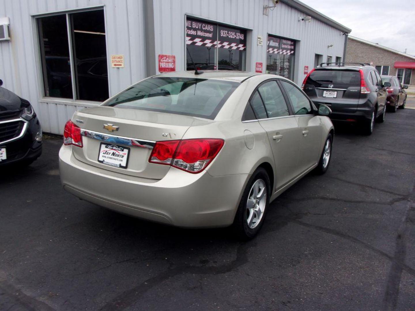 2014 GOLD CHEVROLET CRUZE LT (1G1PC5SB7E7) with an 1.4L engine, Automatic transmission, located at 501 E. Columbia St., Springfield, OH, 45503, (800) 262-7122, 39.925262, -83.801796 - *** New Brakes *** Serviced and Detailed *** LT *** Jay North Auto has offered hand picked vehicles since 1965! Our customer's enjoy a NO pressure buying experience with a small town feel. All of our vehicles get fully inspected and detailed. We are a preferred dealer for many local credit unio - Photo#3