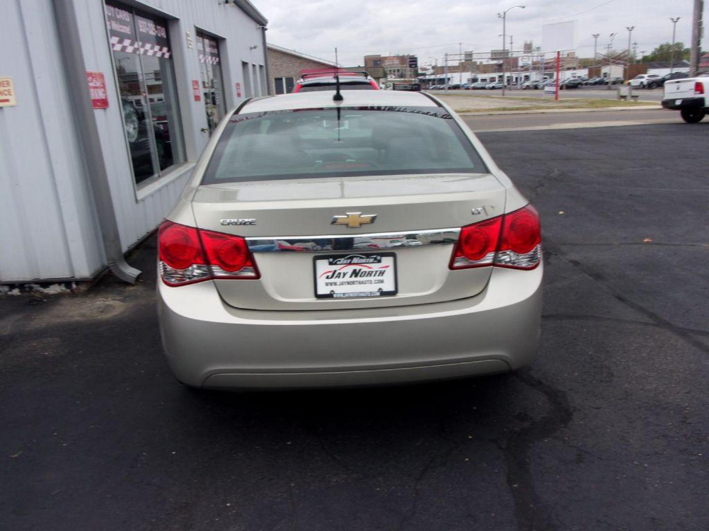 2014 GOLD CHEVROLET CRUZE LT (1G1PC5SB7E7) with an 1.4L engine, Automatic transmission, located at 501 E. Columbia St., Springfield, OH, 45503, (800) 262-7122, 39.925262, -83.801796 - *** New Brakes *** Serviced and Detailed *** LT *** Jay North Auto has offered hand picked vehicles since 1965! Our customer's enjoy a NO pressure buying experience with a small town feel. All of our vehicles get fully inspected and detailed. We are a preferred dealer for many local credit unio - Photo#4