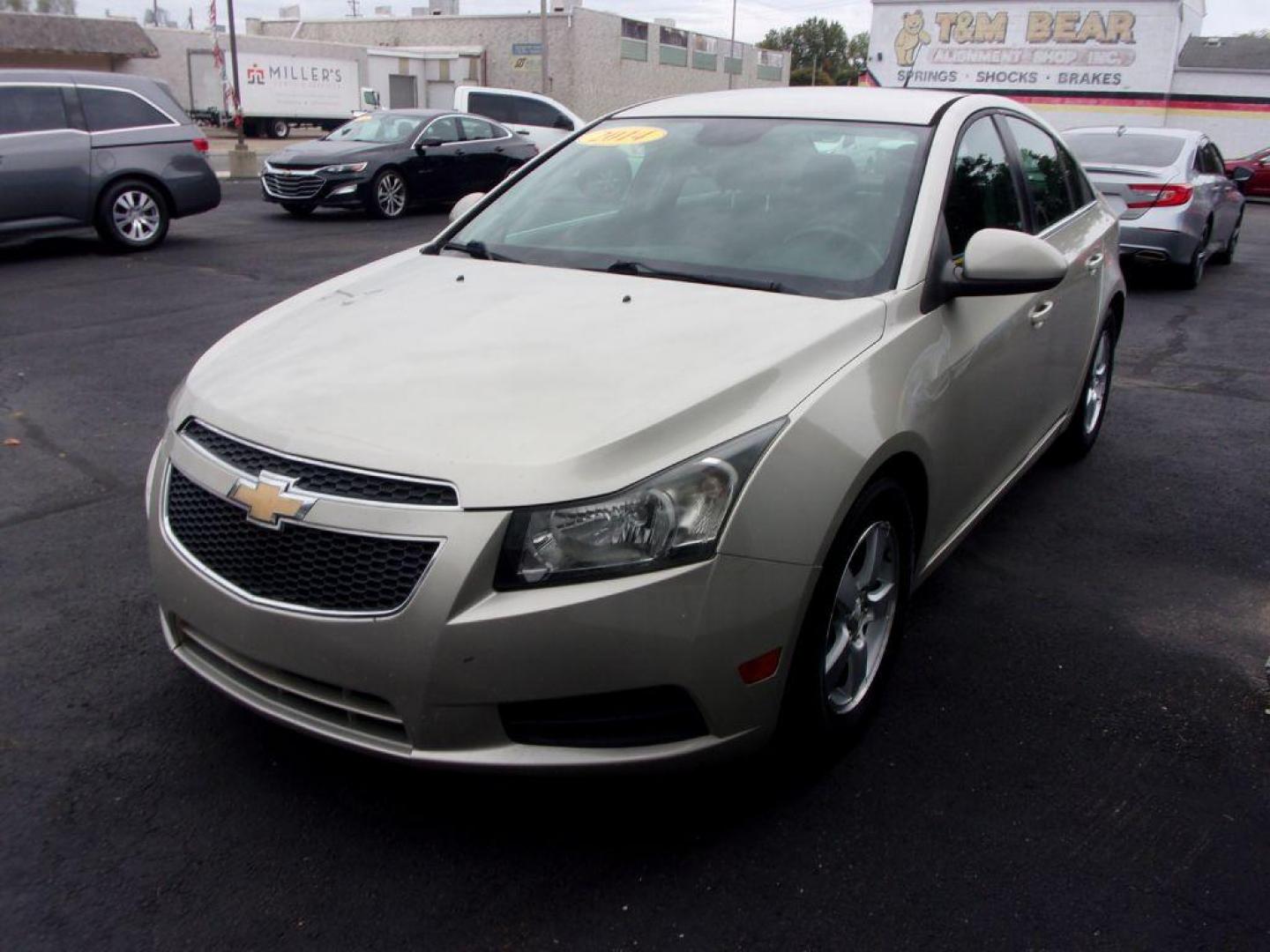 2014 GOLD CHEVROLET CRUZE LT (1G1PC5SB7E7) with an 1.4L engine, Automatic transmission, located at 501 E. Columbia St., Springfield, OH, 45503, (800) 262-7122, 39.925262, -83.801796 - *** New Brakes *** Serviced and Detailed *** LT *** Jay North Auto has offered hand picked vehicles since 1965! Our customer's enjoy a NO pressure buying experience with a small town feel. All of our vehicles get fully inspected and detailed. We are a preferred dealer for many local credit unio - Photo#6