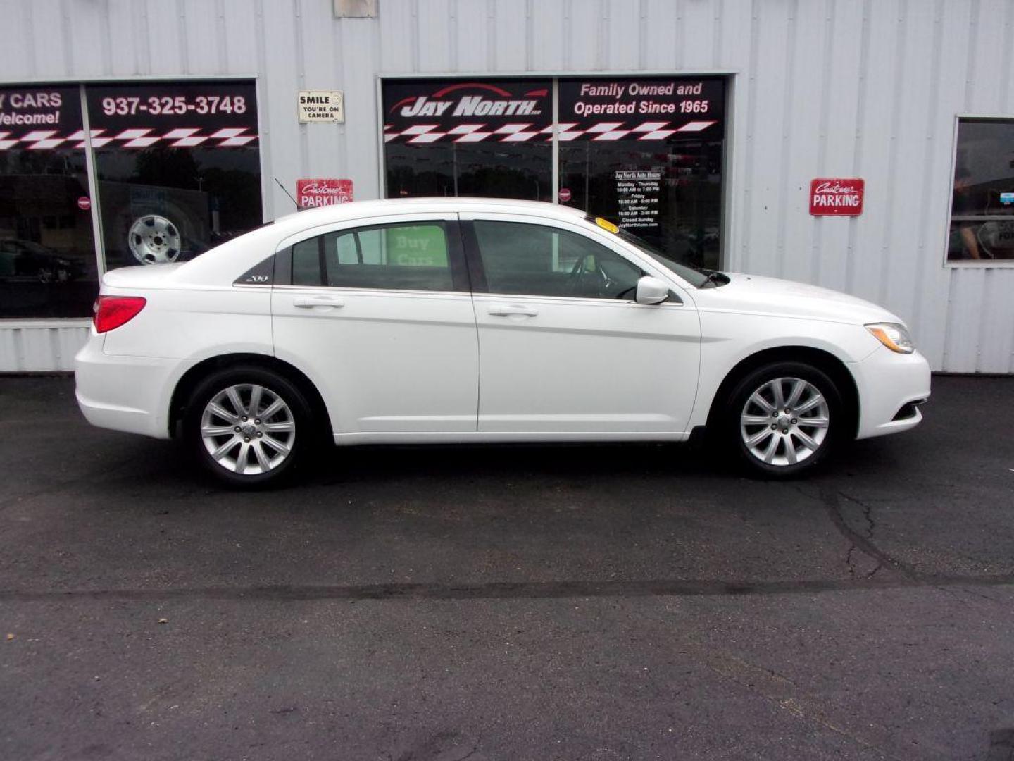 2011 WHITE CHRYSLER 200 TOURING (1C3BC1FB0BN) with an 2.4L engine, Automatic transmission, located at 501 E. Columbia St., Springfield, OH, 45503, (800) 262-7122, 39.925262, -83.801796 - ***New Tires***New Brakes***New Wiper Blades***Touring***2.4L***Serviced and Detailed*** Jay North Auto has offered hand picked vehicles since 1965! Our customer's enjoy a NO pressure buying experience with a small town feel. All of our vehicles get fully inspected and detailed. We are a preferr - Photo#0