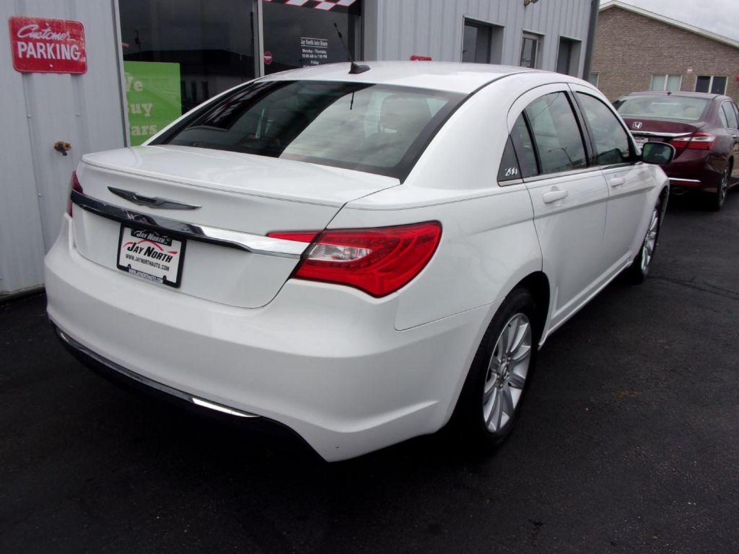 2011 WHITE CHRYSLER 200 TOURING (1C3BC1FB0BN) with an 2.4L engine, Automatic transmission, located at 501 E. Columbia St., Springfield, OH, 45503, (800) 262-7122, 39.925262, -83.801796 - ***New Tires***New Brakes***New Wiper Blades***Touring***2.4L***Serviced and Detailed*** Jay North Auto has offered hand picked vehicles since 1965! Our customer's enjoy a NO pressure buying experience with a small town feel. All of our vehicles get fully inspected and detailed. We are a preferr - Photo#3