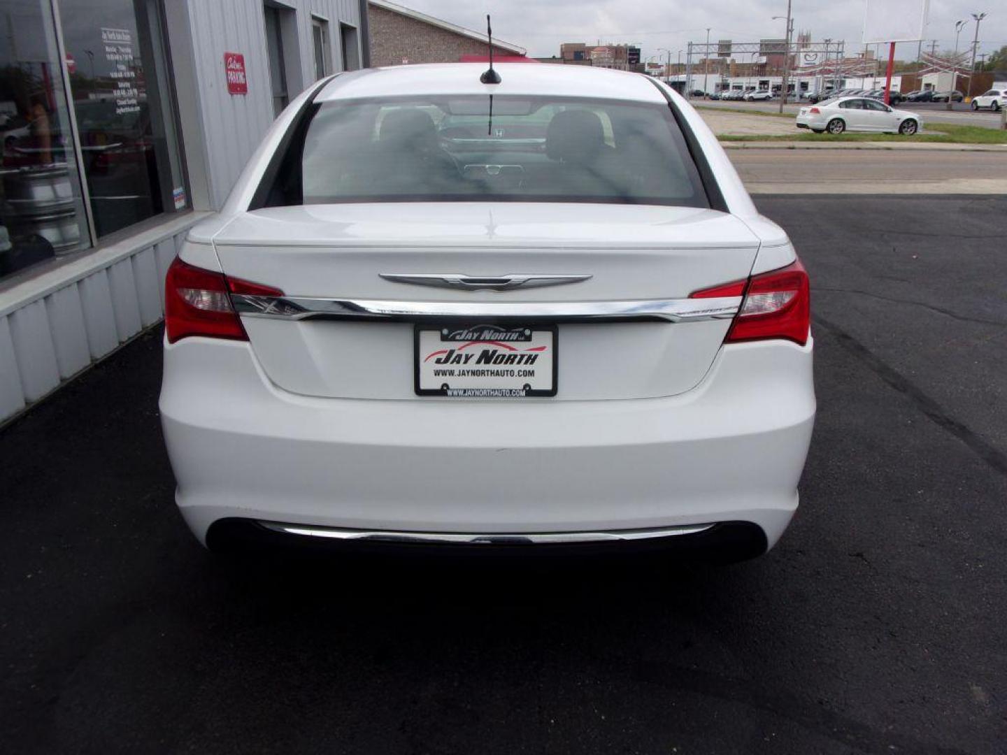 2011 WHITE CHRYSLER 200 TOURING (1C3BC1FB0BN) with an 2.4L engine, Automatic transmission, located at 501 E. Columbia St., Springfield, OH, 45503, (800) 262-7122, 39.925262, -83.801796 - ***New Tires***New Brakes***New Wiper Blades***Touring***2.4L***Serviced and Detailed*** Jay North Auto has offered hand picked vehicles since 1965! Our customer's enjoy a NO pressure buying experience with a small town feel. All of our vehicles get fully inspected and detailed. We are a preferr - Photo#4