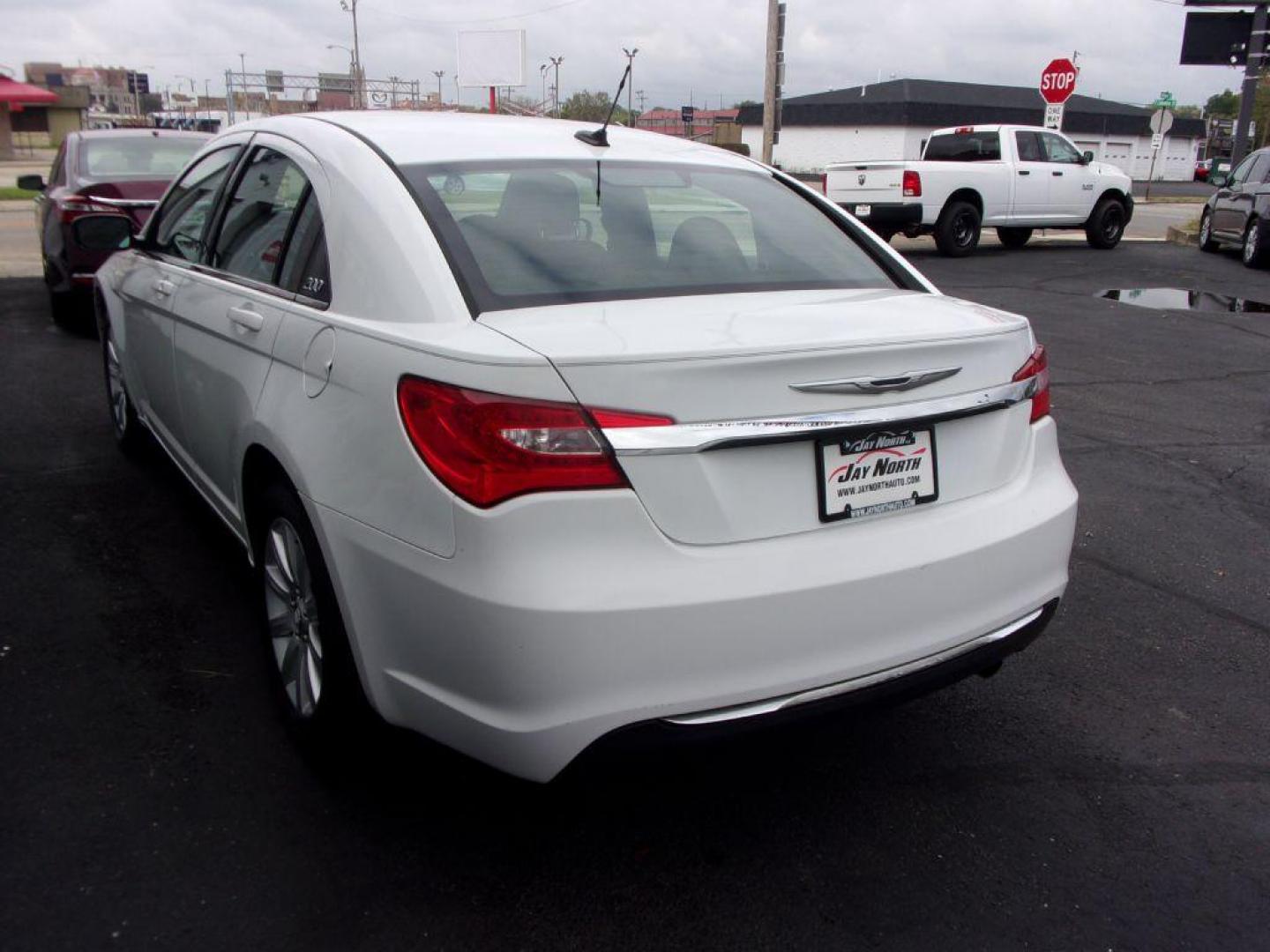 2011 WHITE CHRYSLER 200 TOURING (1C3BC1FB0BN) with an 2.4L engine, Automatic transmission, located at 501 E. Columbia St., Springfield, OH, 45503, (800) 262-7122, 39.925262, -83.801796 - ***New Tires***New Brakes***New Wiper Blades***Touring***2.4L***Serviced and Detailed*** Jay North Auto has offered hand picked vehicles since 1965! Our customer's enjoy a NO pressure buying experience with a small town feel. All of our vehicles get fully inspected and detailed. We are a preferr - Photo#5