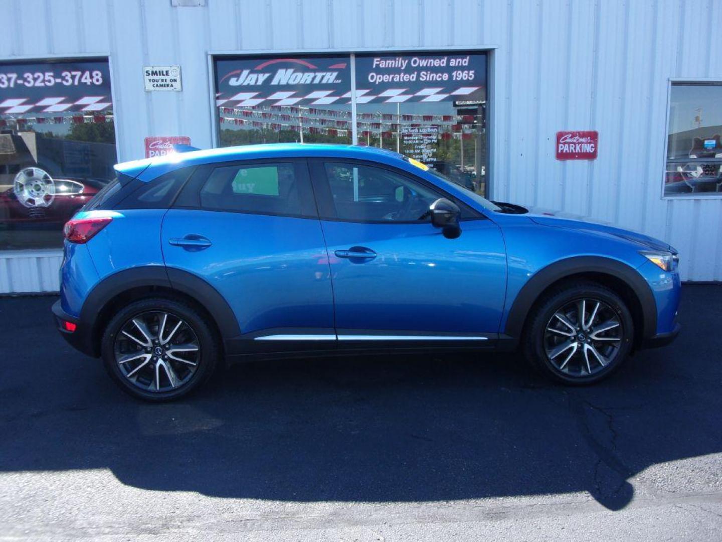 2016 BLUE MAZDA CX-3 GRAND TOURING (JM1DKBD77G0) with an 2.0L engine, Automatic transmission, located at 501 E. Columbia St., Springfield, OH, 45503, (800) 262-7122, 39.925262, -83.801796 - ***New Tires***New Front and Rear Pads and Rotors***Heated Seats***Sunroof***Grand Touring***Serviced and Detailed*** Jay North Auto has offered hand picked vehicles since 1965! Our customer's enjoy a NO pressure buying experience with a small town feel. All of our vehicles get fully inspected a - Photo#0