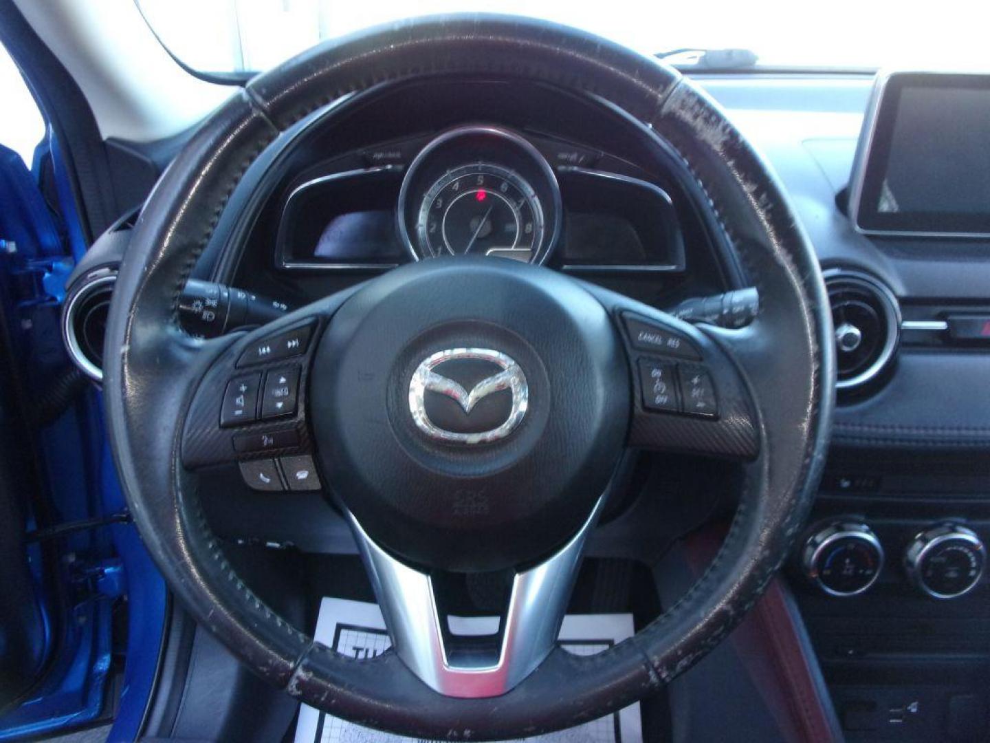 2016 BLUE MAZDA CX-3 GRAND TOURING (JM1DKBD77G0) with an 2.0L engine, Automatic transmission, located at 501 E. Columbia St., Springfield, OH, 45503, (800) 262-7122, 39.925262, -83.801796 - ***New Tires***New Front and Rear Pads and Rotors***Heated Seats***Sunroof***Grand Touring***Serviced and Detailed*** Jay North Auto has offered hand picked vehicles since 1965! Our customer's enjoy a NO pressure buying experience with a small town feel. All of our vehicles get fully inspected a - Photo#9