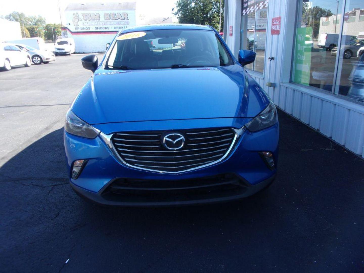 2016 BLUE MAZDA CX-3 GRAND TOURING (JM1DKBD77G0) with an 2.0L engine, Automatic transmission, located at 501 E. Columbia St., Springfield, OH, 45503, (800) 262-7122, 39.925262, -83.801796 - ***New Tires***New Front and Rear Pads and Rotors***Heated Seats***Sunroof***Grand Touring***Serviced and Detailed*** Jay North Auto has offered hand picked vehicles since 1965! Our customer's enjoy a NO pressure buying experience with a small town feel. All of our vehicles get fully inspected a - Photo#1