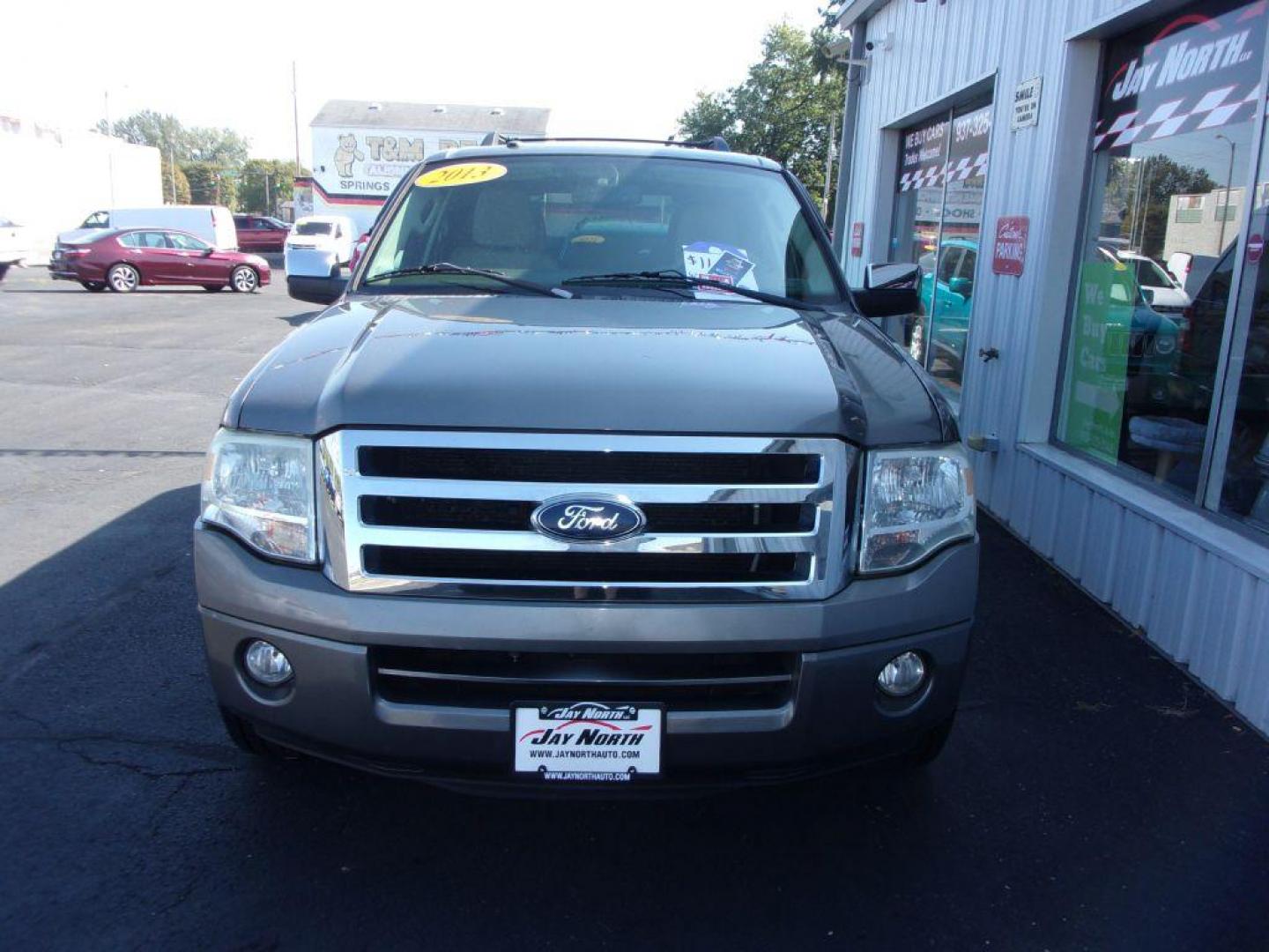 2013 GRAY FORD EXPEDITION XLT (1FMJU1H53DE) with an 5.4L engine, Automatic transmission, located at 501 E. Columbia St., Springfield, OH, 45503, (800) 262-7122, 39.925262, -83.801796 - *** New Tires *** 5.4L RWD *** 3RD Row Seating *** Serviced and Detailed ***( Moonroof needs repaired to be used ) *** Jay North Auto has offered hand picked vehicles since 1965! Our customer's enjoy a NO pressure buying experience with a small town feel. All of our vehicles get fully inspected - Photo#2