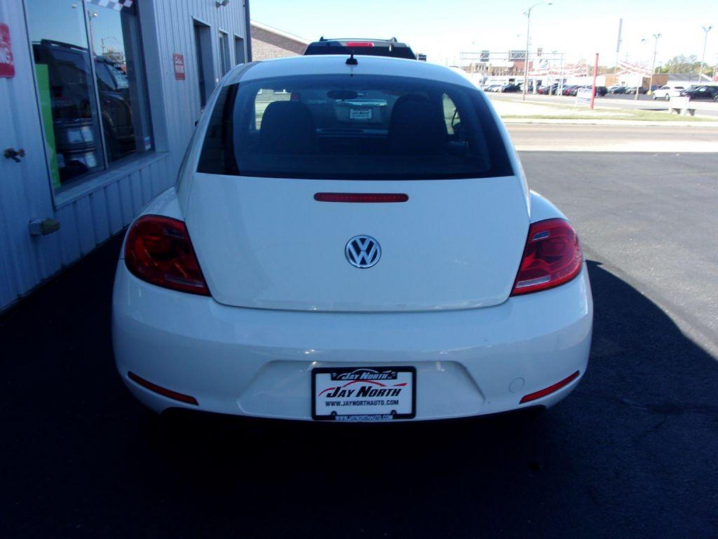 2013 WHITE VOLKSWAGEN BEETLE 2.5L (3VWFP7AT4DM) with an 2.5L engine, Automatic transmission, located at 501 E. Columbia St., Springfield, OH, 45503, (800) 262-7122, 39.925262, -83.801796 - ***Only 84k Miles***2.5L***SHARP***VW Beetle***Serviced and Detailed*** Jay North Auto has offered hand picked vehicles since 1965! Our customer's enjoy a NO pressure buying experience with a small town feel. All of our vehicles get fully inspected and detailed. We are a preferred dealer for man - Photo#4