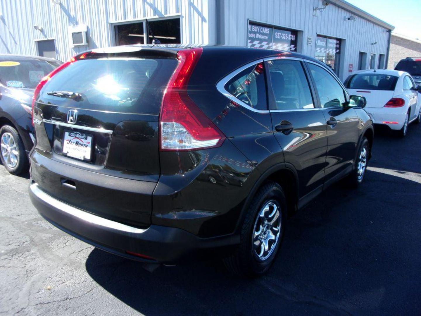 2013 BROWN HONDA CR-V LX (5J6RM3H38DL) with an 2.4L engine, Automatic transmission, located at 501 E. Columbia St., Springfield, OH, 45503, (800) 262-7122, 39.925262, -83.801796 - *** New Tires *** LX *** FWD *** Serviced and Detailed *** 21 Service Records on Clean CarFax *** Jay North Auto has offered hand picked vehicles since 1965! Our customer's enjoy a NO pressure buying experience with a small town feel. All of our vehicles get fully inspected and detailed. We are - Photo#3