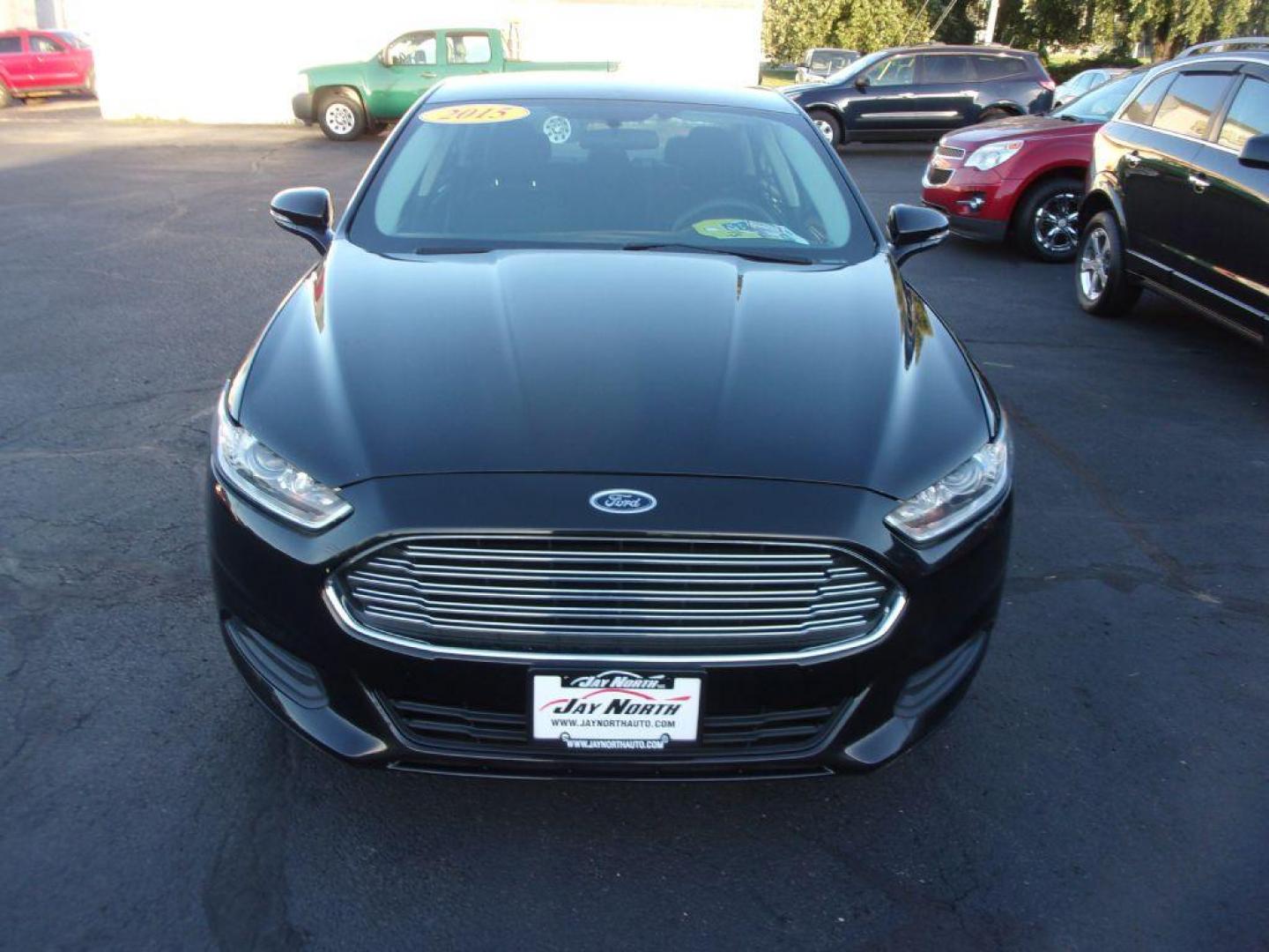 2015 BLACK FORD FUSION SE (1FA6P0H74F5) with an 2.5L engine, Automatic transmission, located at 501 E. Columbia St., Springfield, OH, 45503, (800) 262-7122, 39.925262, -83.801796 - Photo#2