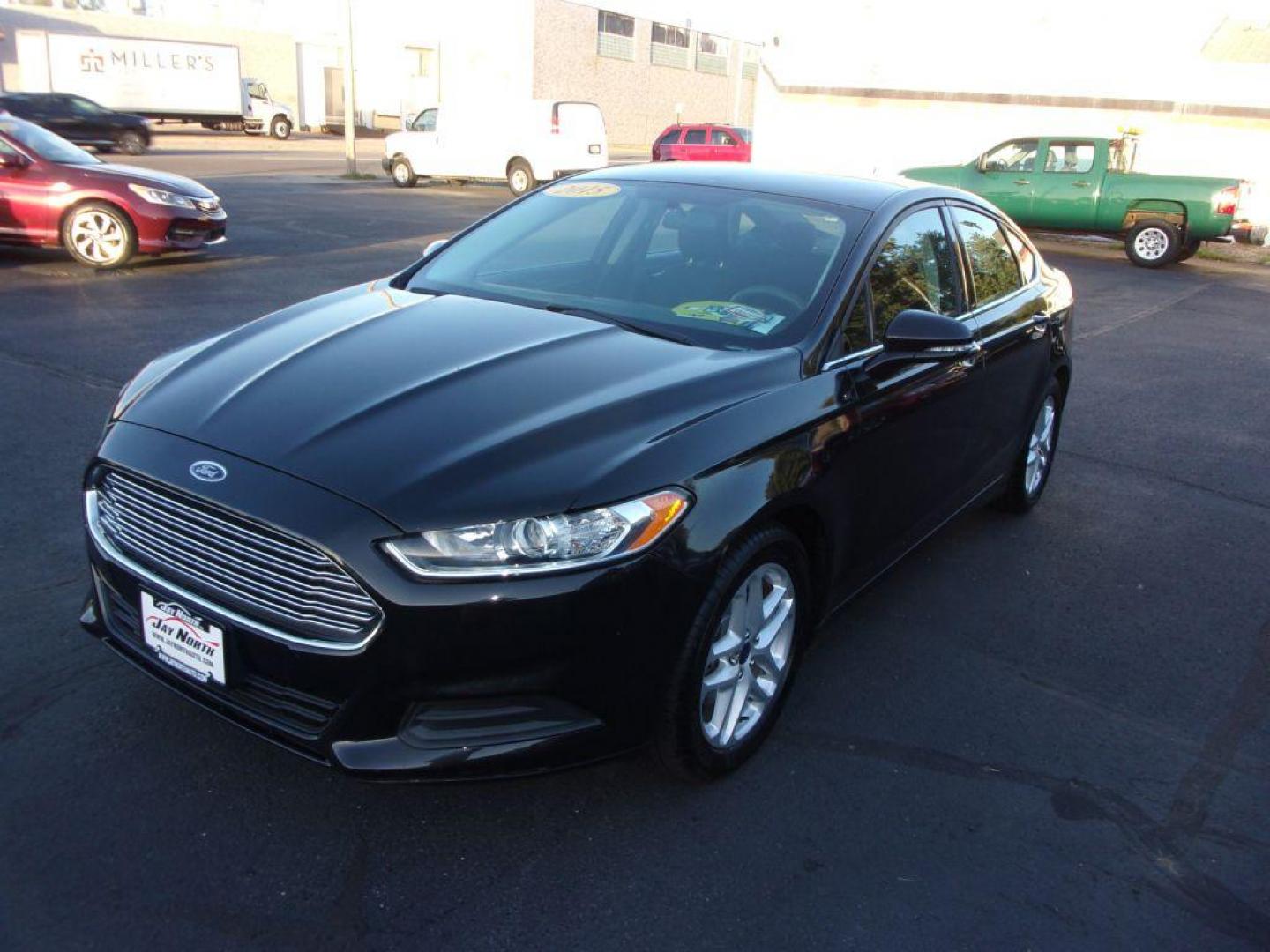 2015 BLACK FORD FUSION SE (1FA6P0H74F5) with an 2.5L engine, Automatic transmission, located at 501 E. Columbia St., Springfield, OH, 45503, (800) 262-7122, 39.925262, -83.801796 - Photo#3