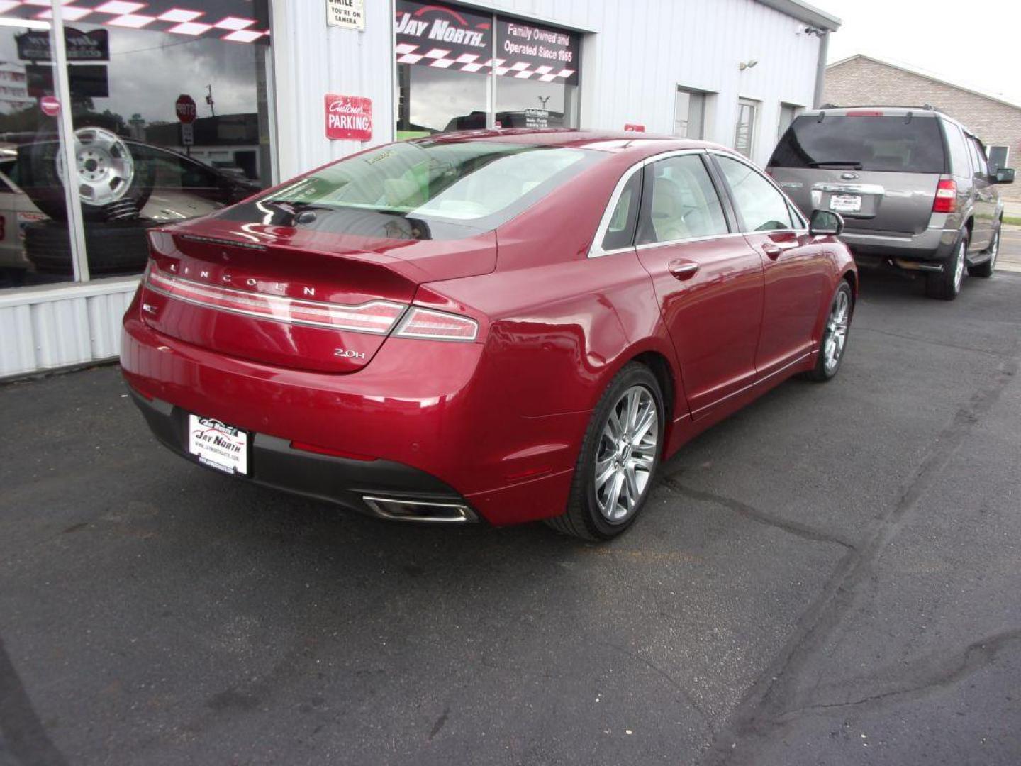 2013 RED LINCOLN MKZ HYBRID (3LN6L2LU5DR) with an 2.0L engine, Continuously Variable transmission, located at 501 E. Columbia St., Springfield, OH, 45503, (800) 262-7122, 39.925262, -83.801796 - *** Leather *** Moonroof ** Premium Audio ** Back Up Camera *** Hybrid *** Jay North Auto has offered hand picked vehicles since 1965! Our customer's enjoy a NO pressure buying experience with a small town feel. All of our vehicles get fully inspected and detailed. We are a preferred dealer for - Photo#3