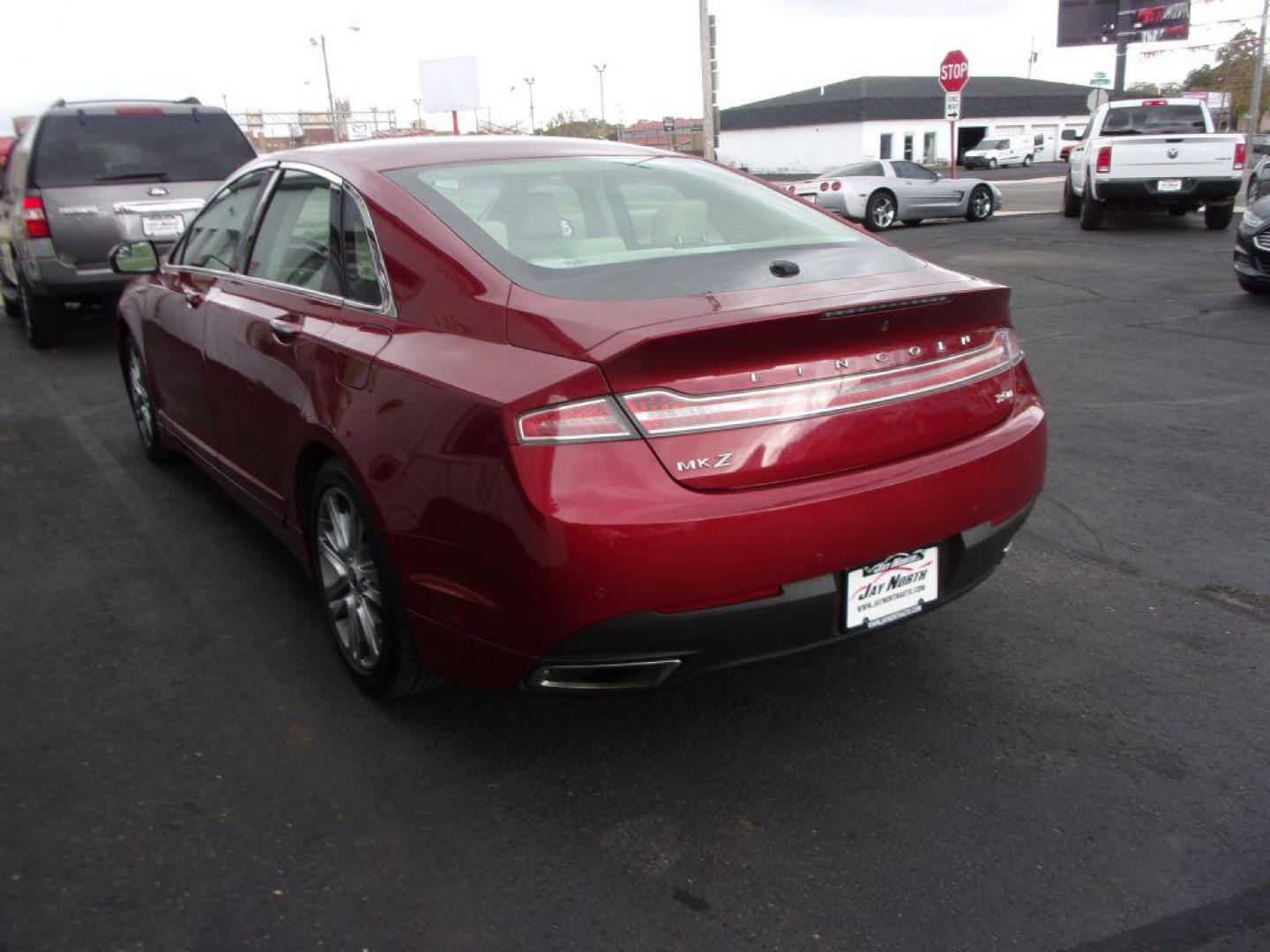 2013 RED LINCOLN MKZ HYBRID (3LN6L2LU5DR) with an 2.0L engine, Continuously Variable transmission, located at 501 E. Columbia St., Springfield, OH, 45503, (800) 262-7122, 39.925262, -83.801796 - *** Leather *** Moonroof ** Premium Audio ** Back Up Camera *** Hybrid *** Jay North Auto has offered hand picked vehicles since 1965! Our customer's enjoy a NO pressure buying experience with a small town feel. All of our vehicles get fully inspected and detailed. We are a preferred dealer for - Photo#5