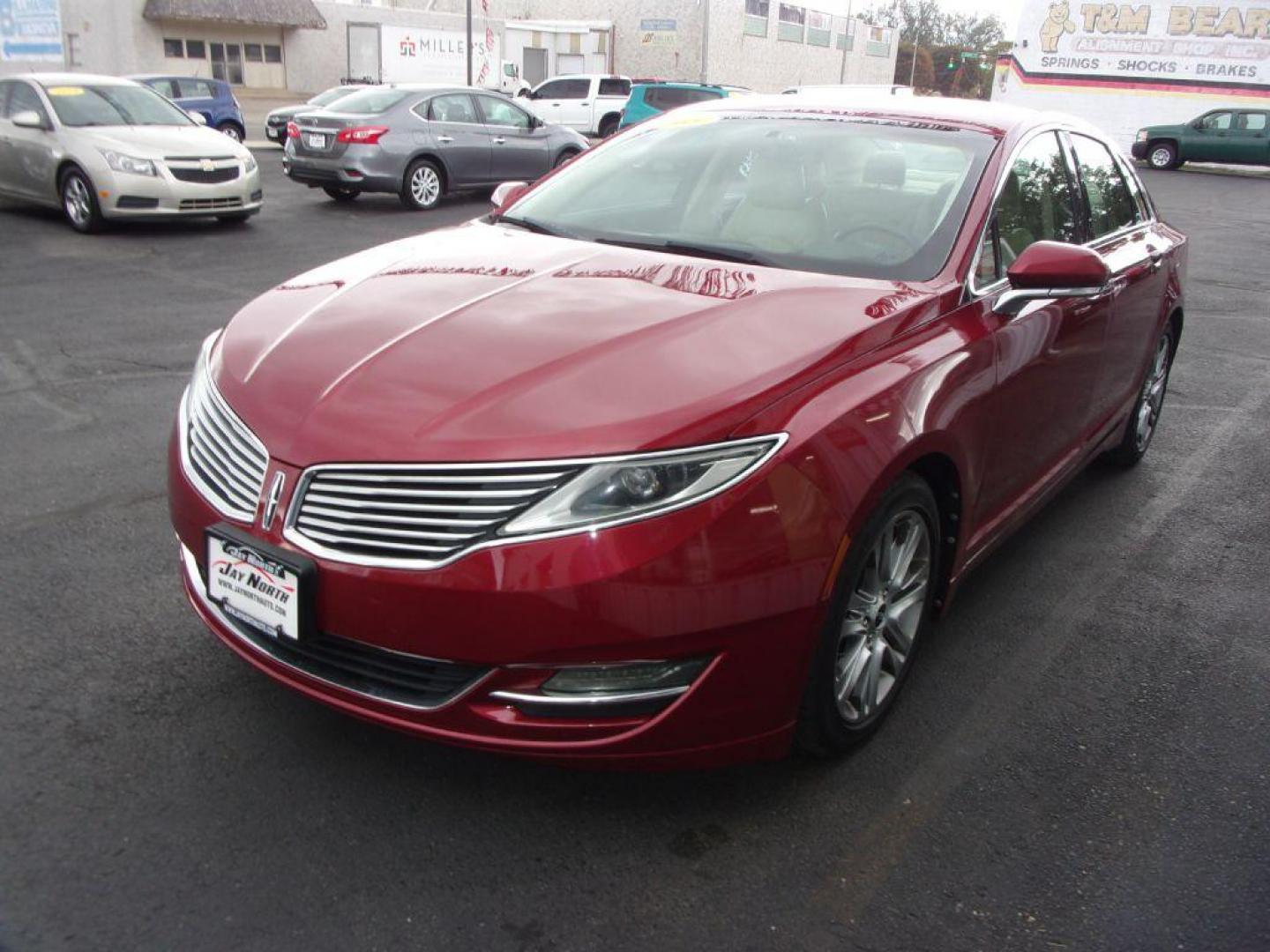 2013 RED LINCOLN MKZ HYBRID (3LN6L2LU5DR) with an 2.0L engine, Continuously Variable transmission, located at 501 E. Columbia St., Springfield, OH, 45503, (800) 262-7122, 39.925262, -83.801796 - *** Leather *** Moonroof ** Premium Audio ** Back Up Camera *** Hybrid *** Jay North Auto has offered hand picked vehicles since 1965! Our customer's enjoy a NO pressure buying experience with a small town feel. All of our vehicles get fully inspected and detailed. We are a preferred dealer for - Photo#6