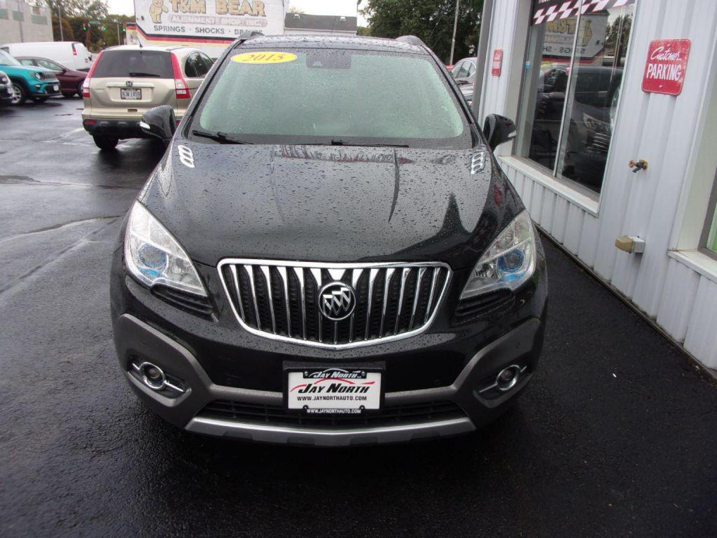 2015 BLACK BUICK ENCORE PREMIUM (KL4CJDSBXFB) with an 1.4L engine, Automatic transmission, located at 501 E. Columbia St., Springfield, OH, 45503, (800) 262-7122, 39.925262, -83.801796 - ***Heated Leather Seating***Heated Steering Wheel***Sunroof***FWD***Serviced and Detailed*** 31 Service Records on CarFax *** Jay North Auto has offered hand picked vehicles since 1965! Our customer's enjoy a NO pressure buying experience with a small town feel. All of our vehicles get fully ins - Photo#2