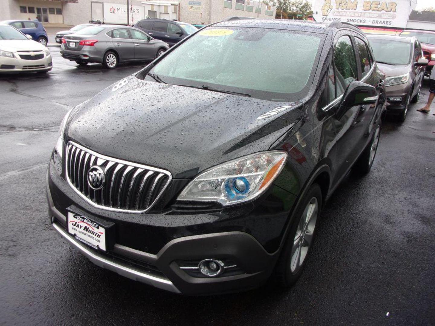 2015 BLACK BUICK ENCORE PREMIUM (KL4CJDSBXFB) with an 1.4L engine, Automatic transmission, located at 501 E. Columbia St., Springfield, OH, 45503, (800) 262-7122, 39.925262, -83.801796 - ***Heated Leather Seating***Heated Steering Wheel***Sunroof***FWD***Serviced and Detailed*** 31 Service Records on CarFax *** Jay North Auto has offered hand picked vehicles since 1965! Our customer's enjoy a NO pressure buying experience with a small town feel. All of our vehicles get fully ins - Photo#3