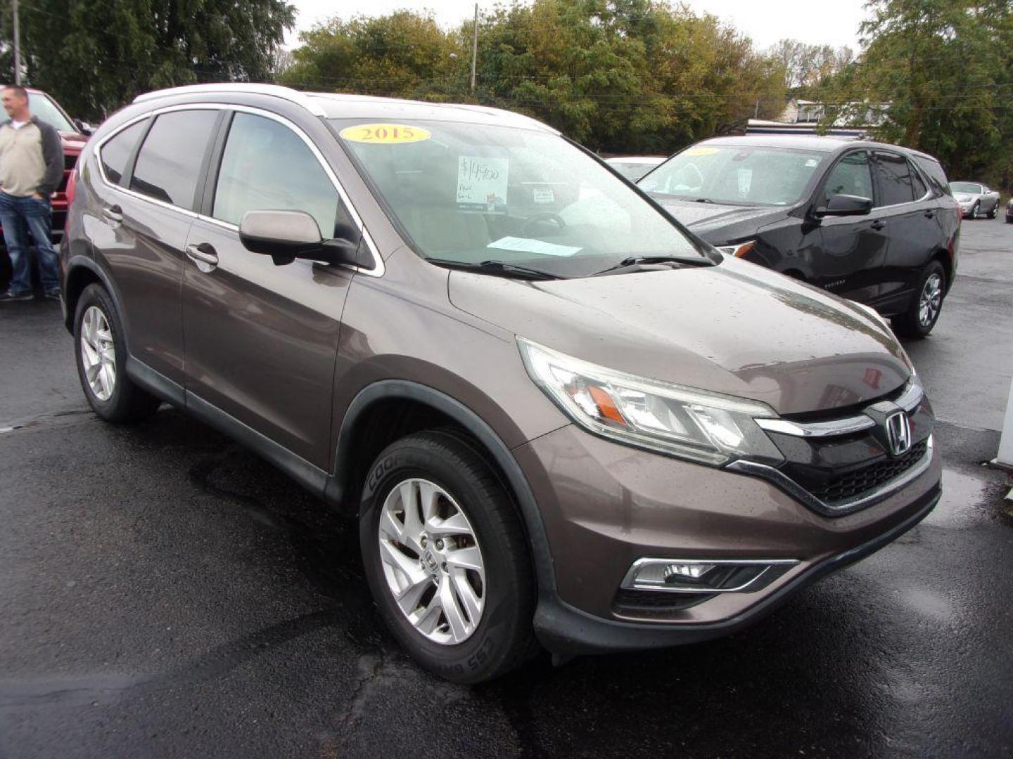 2015 PEWTER HONDA CR-V EXL (2HKRM4H79FH) with an 2.4L engine, Continuously Variable transmission, located at 501 E. Columbia St., Springfield, OH, 45503, (800) 262-7122, 39.925262, -83.801796 - *** AWD *** Serviced and Detailed *** Leather Seating *** Moonroof *** EX-L *** Jay North Auto has offered hand picked vehicles since 1965! Our customer's enjoy a NO pressure buying experience with a small town feel. All of our vehicles get fully inspected and detailed. We are a preferred dealer - Photo#1