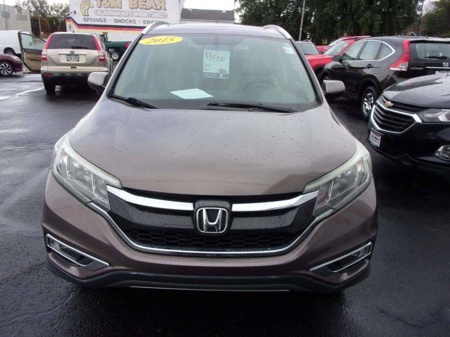 2015 PEWTER HONDA CR-V EXL (2HKRM4H79FH) with an 2.4L engine, Continuously Variable transmission, located at 501 E. Columbia St., Springfield, OH, 45503, (800) 262-7122, 39.925262, -83.801796 - *** AWD *** Serviced and Detailed *** Leather Seating *** Moonroof *** EX-L *** Jay North Auto has offered hand picked vehicles since 1965! Our customer's enjoy a NO pressure buying experience with a small town feel. All of our vehicles get fully inspected and detailed. We are a preferred dealer - Photo#2