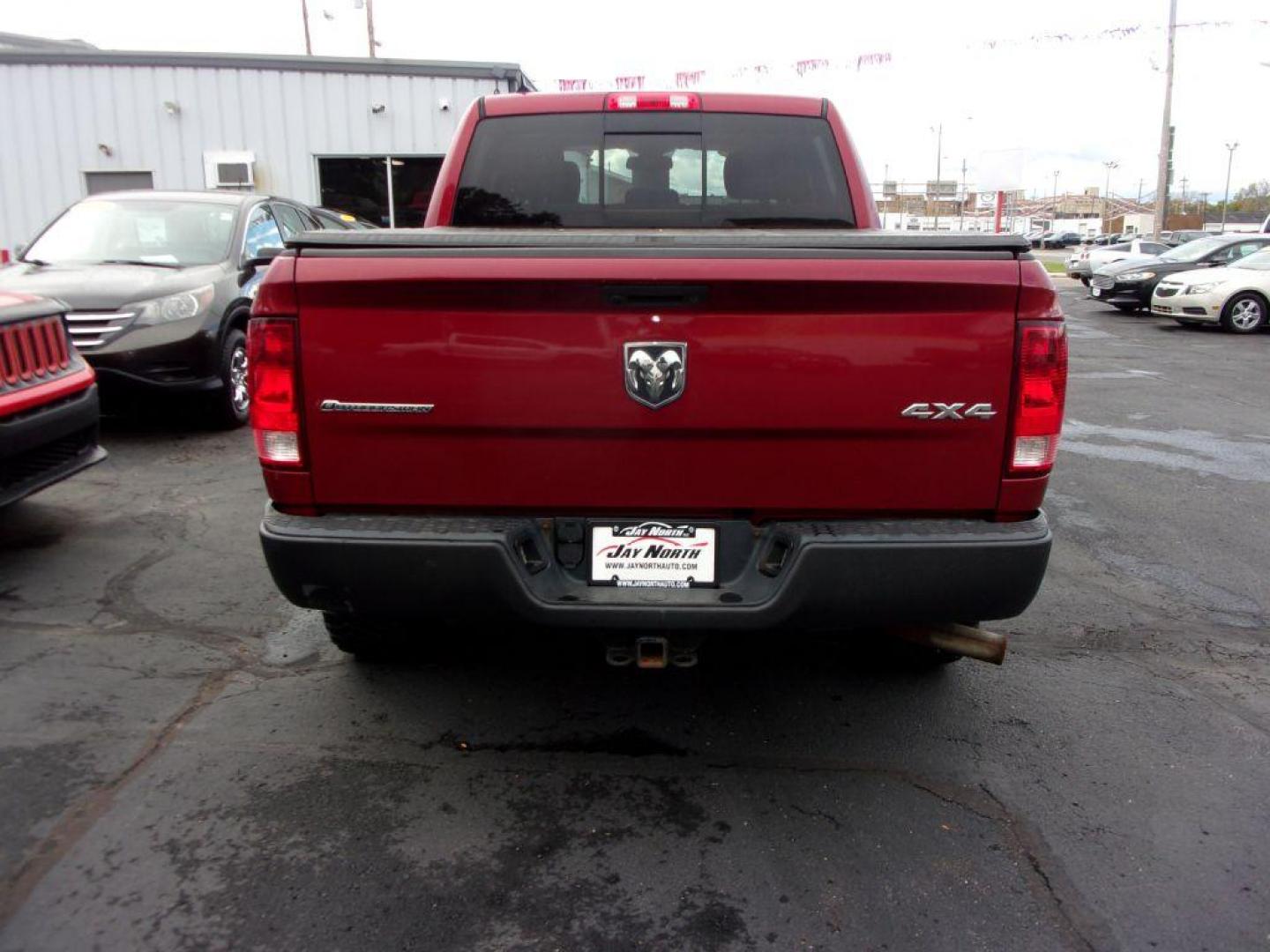 2014 RED RAM 1500 OUTDOORSMAN (1C6RR7LT9ES) with an 5.7L engine, Automatic transmission, located at 501 E. Columbia St., Springfield, OH, 45503, (800) 262-7122, 39.925262, -83.801796 - *** Outdoorsman *** Fuel Wheels w/ AT Tires *** Hemi *** Heated Seats *** Heated Steering Wheel *** Navigation w/ Premium Audio *** Serviced and Detailed *** Spray In Bedliner *** Running Boards *** NICE!!! *** 3.92 Rear Axle Ratio *** Jay North Auto has offered hand picked vehicles since 1965! - Photo#4