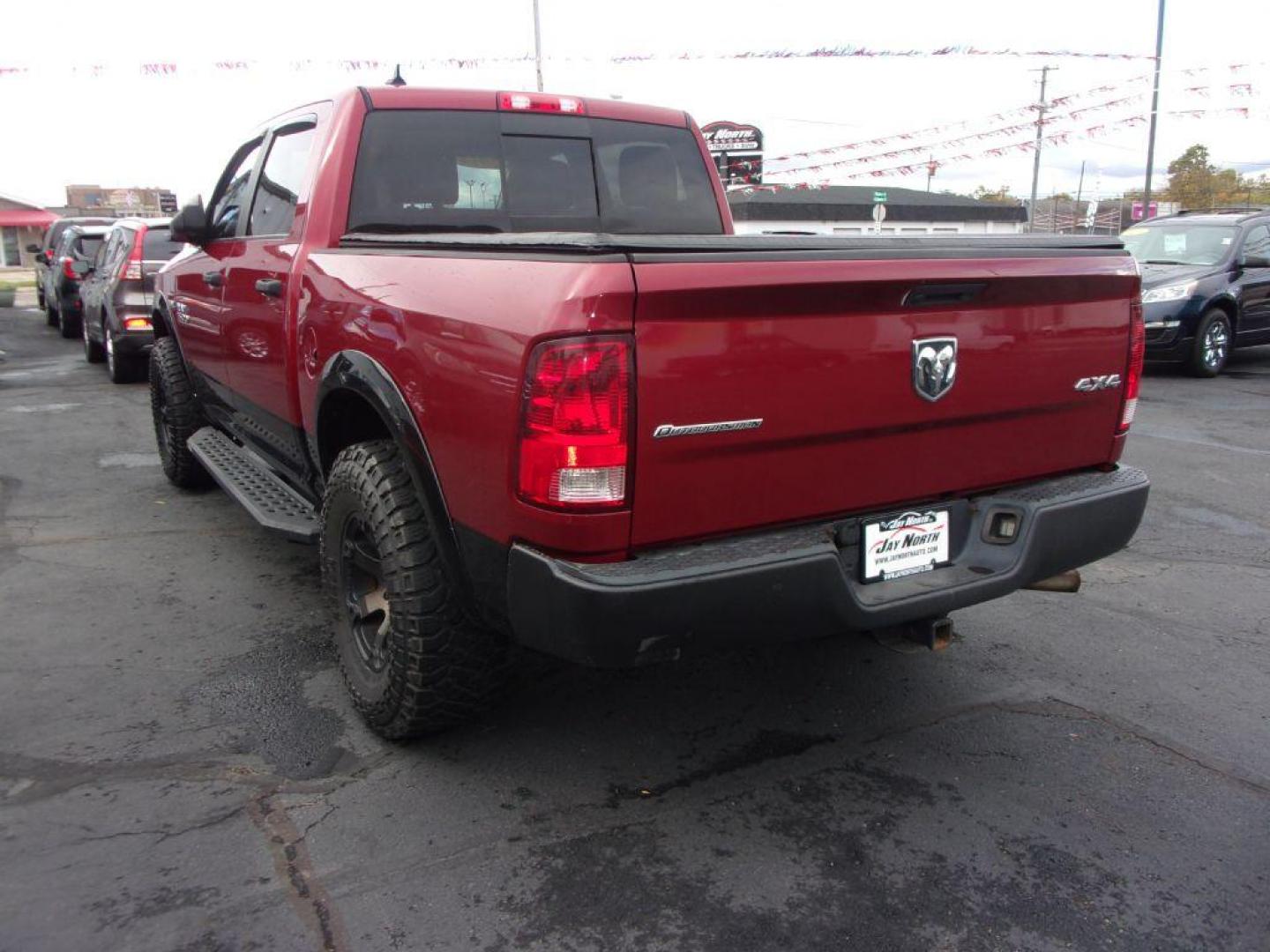 2014 RED RAM 1500 OUTDOORSMAN (1C6RR7LT9ES) with an 5.7L engine, Automatic transmission, located at 501 E. Columbia St., Springfield, OH, 45503, (800) 262-7122, 39.925262, -83.801796 - *** Outdoorsman *** Fuel Wheels w/ AT Tires *** Hemi *** Heated Seats *** Heated Steering Wheel *** Navigation w/ Premium Audio *** Serviced and Detailed *** Spray In Bedliner *** Running Boards *** NICE!!! *** 3.92 Rear Axle Ratio *** Jay North Auto has offered hand picked vehicles since 1965! - Photo#5