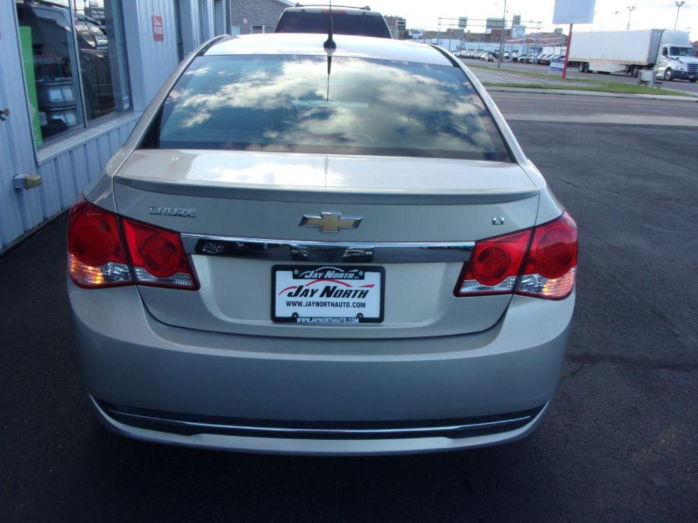 2012 GOLD CHEVROLET CRUZE LT (1G1PG5SC4C7) with an 1.4L engine, Automatic transmission, located at 501 E. Columbia St., Springfield, OH, 45503, (800) 262-7122, 39.925262, -83.801796 - *** Serviced and Detailed *** LT *** Remote Start *** Heated Leather Seating *** Moonroof *** Jay North Auto has offered hand picked vehicles since 1965! Our customer's enjoy a NO pressure buying experience with a small town feel. All of our vehicles get fully inspected and detailed. We are a p - Photo#5