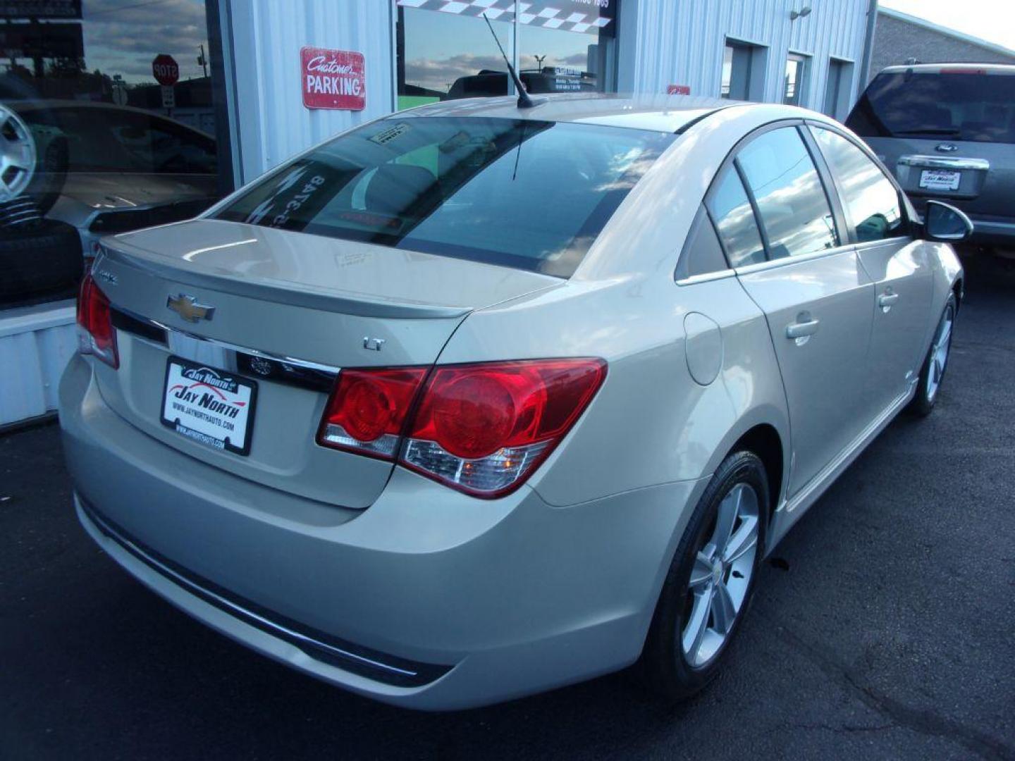 2012 GOLD CHEVROLET CRUZE LT (1G1PG5SC4C7) with an 1.4L engine, Automatic transmission, located at 501 E. Columbia St., Springfield, OH, 45503, (800) 262-7122, 39.925262, -83.801796 - *** Serviced and Detailed *** LT *** Remote Start *** Heated Leather Seating *** Moonroof *** Jay North Auto has offered hand picked vehicles since 1965! Our customer's enjoy a NO pressure buying experience with a small town feel. All of our vehicles get fully inspected and detailed. We are a p - Photo#6