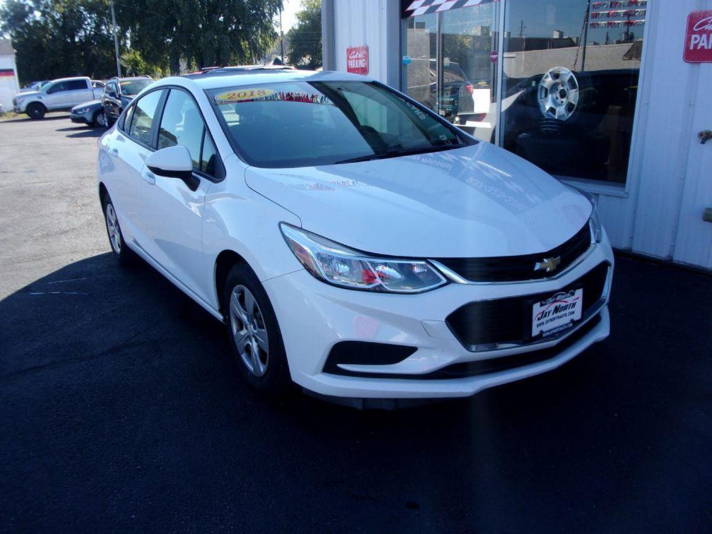 2018 WHITE CHEVROLET CRUZE LS (1G1BC5SM0J7) with an 1.4L engine, Automatic transmission, located at 501 E. Columbia St., Springfield, OH, 45503, (800) 262-7122, 39.925262, -83.801796 - *** New Tires *** Serviced and Detailed *** Back Up Camera *** Clean CarFax *** LS *** Jay North Auto has offered hand picked vehicles since 1965! Our customer's enjoy a NO pressure buying experience with a small town feel. All of our vehicles get fully inspected and detailed. We are a preferred - Photo#2