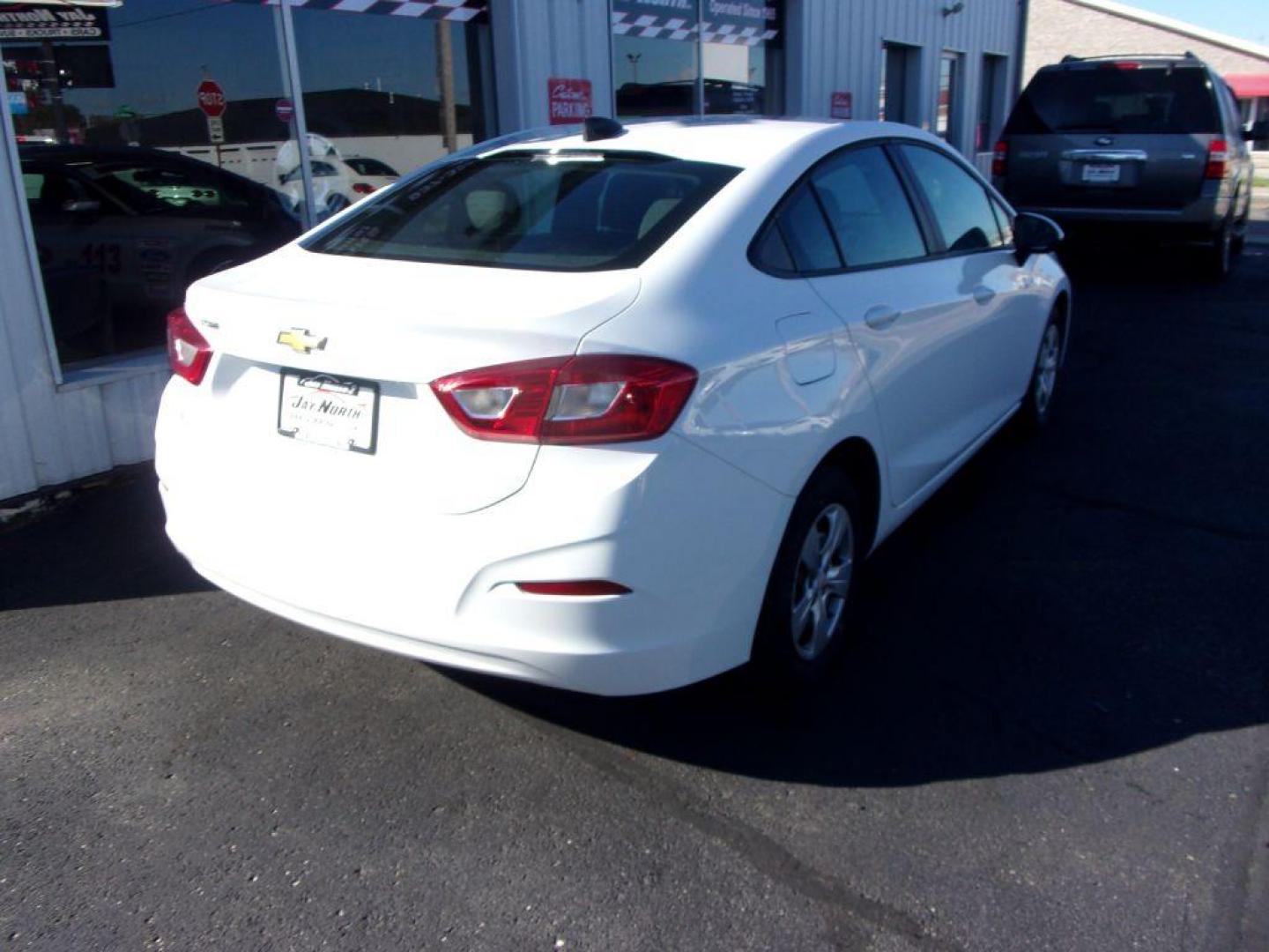 2018 WHITE CHEVROLET CRUZE LS (1G1BC5SM0J7) with an 1.4L engine, Automatic transmission, located at 501 E. Columbia St., Springfield, OH, 45503, (800) 262-7122, 39.925262, -83.801796 - *** New Tires *** Serviced and Detailed *** Back Up Camera *** Clean CarFax *** LS *** Jay North Auto has offered hand picked vehicles since 1965! Our customer's enjoy a NO pressure buying experience with a small town feel. All of our vehicles get fully inspected and detailed. We are a preferred - Photo#3