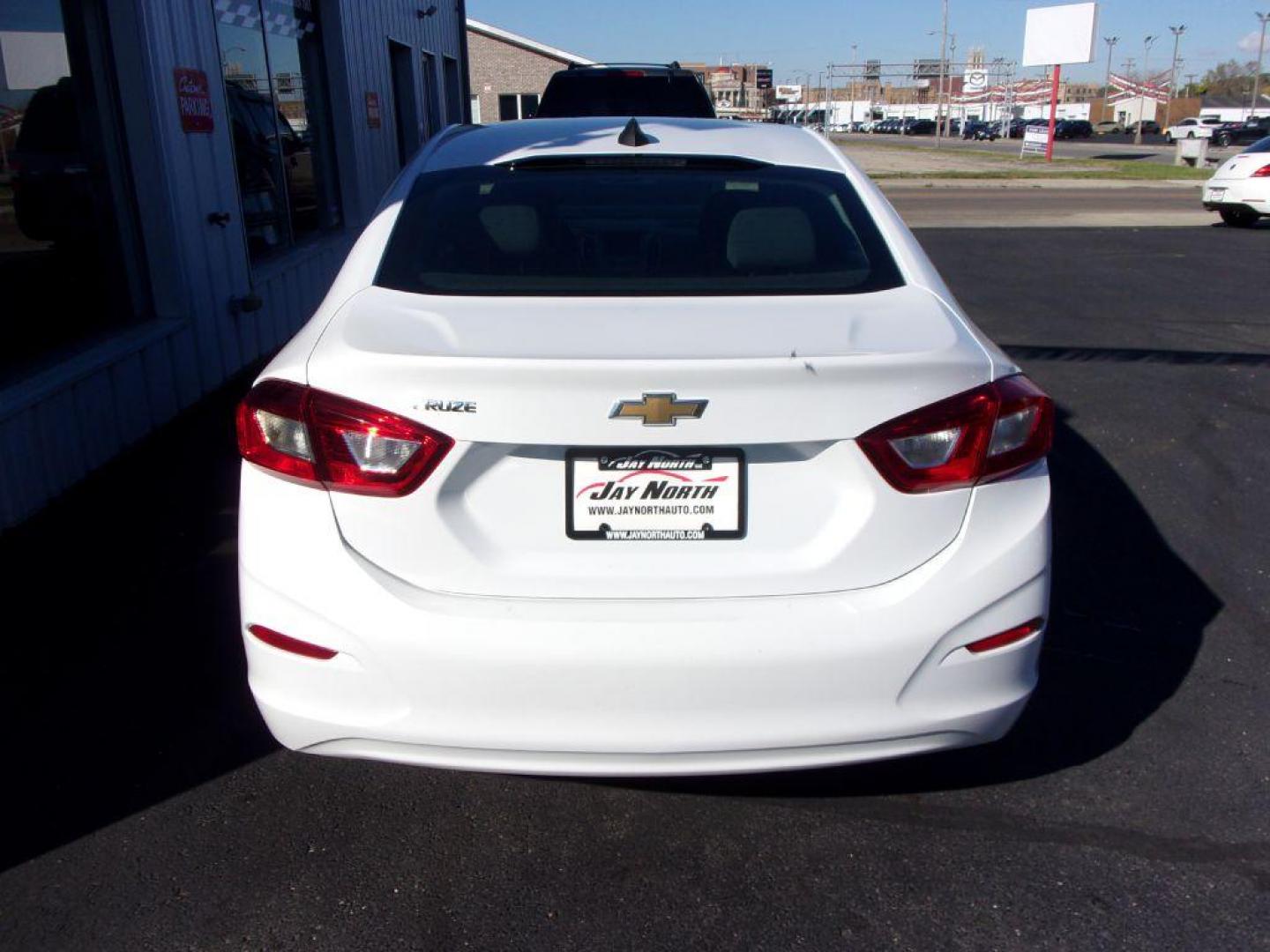 2018 WHITE CHEVROLET CRUZE LS (1G1BC5SM0J7) with an 1.4L engine, Automatic transmission, located at 501 E. Columbia St., Springfield, OH, 45503, (800) 262-7122, 39.925262, -83.801796 - *** New Tires *** Serviced and Detailed *** Back Up Camera *** Clean CarFax *** LS *** Jay North Auto has offered hand picked vehicles since 1965! Our customer's enjoy a NO pressure buying experience with a small town feel. All of our vehicles get fully inspected and detailed. We are a preferred - Photo#4