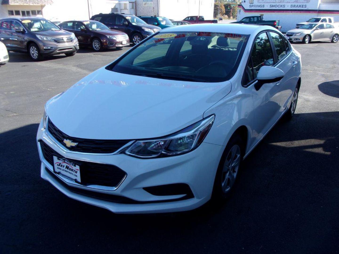 2018 WHITE CHEVROLET CRUZE LS (1G1BC5SM0J7) with an 1.4L engine, Automatic transmission, located at 501 E. Columbia St., Springfield, OH, 45503, (800) 262-7122, 39.925262, -83.801796 - *** New Tires *** Serviced and Detailed *** Back Up Camera *** Clean CarFax *** LS *** Jay North Auto has offered hand picked vehicles since 1965! Our customer's enjoy a NO pressure buying experience with a small town feel. All of our vehicles get fully inspected and detailed. We are a preferred - Photo#6