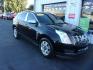 2016 BLACK CADILLAC SRX LUXURY COLLECTION (3GYFNEE32GS) with an 3.6L engine, Automatic transmission, located at 501 E. Columbia St., Springfield, OH, 45503, (800) 262-7122, 39.925262, -83.801796 - *** Luxury Collection *** Panoramic Moonroof *** Bose Audio with Back Up Camera *** Power Lift Gate *** V6 AWD *** Serviced and Detailed *** Remote Start *** Jay North Auto has offered hand picked vehicles since 1965! Our customer's enjoy a NO pressure buying experience with a small town feel. A - Photo#1