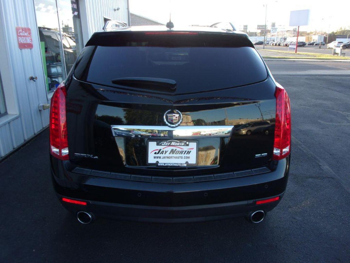 2016 BLACK CADILLAC SRX LUXURY COLLECTION (3GYFNEE32GS) with an 3.6L engine, Automatic transmission, located at 501 E. Columbia St., Springfield, OH, 45503, (800) 262-7122, 39.925262, -83.801796 - *** Luxury Collection *** Panoramic Moonroof *** Bose Audio with Back Up Camera *** Power Lift Gate *** V6 AWD *** Serviced and Detailed *** Remote Start *** Jay North Auto has offered hand picked vehicles since 1965! Our customer's enjoy a NO pressure buying experience with a small town feel. A - Photo#2