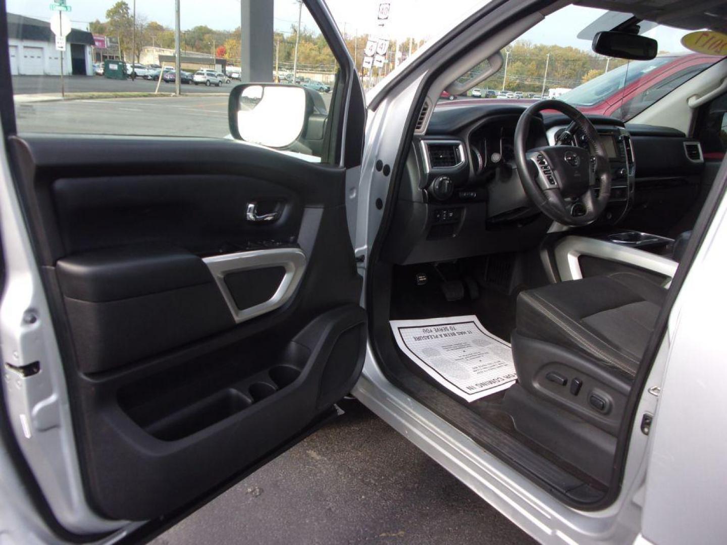 2017 SILVER NISSAN TITAN SV (1N6AA1E56HN) with an 5.6L engine, Automatic transmission, located at 501 E. Columbia St., Springfield, OH, 45503, (800) 262-7122, 39.925262, -83.801796 - *** 5.6L V8 4x4 *** Back Up Camera *** New AT Tires *** Heated Seats *** Tow *** Crew Cab *** Navigation w/ Premium Audio *** Parking Sensors *** Power Slide Rear Window *** Blind Spot *** Serviced and Detailed *** Jay North Auto has offered hand picked vehicles since 1965! Our customer's enjoy - Photo#9