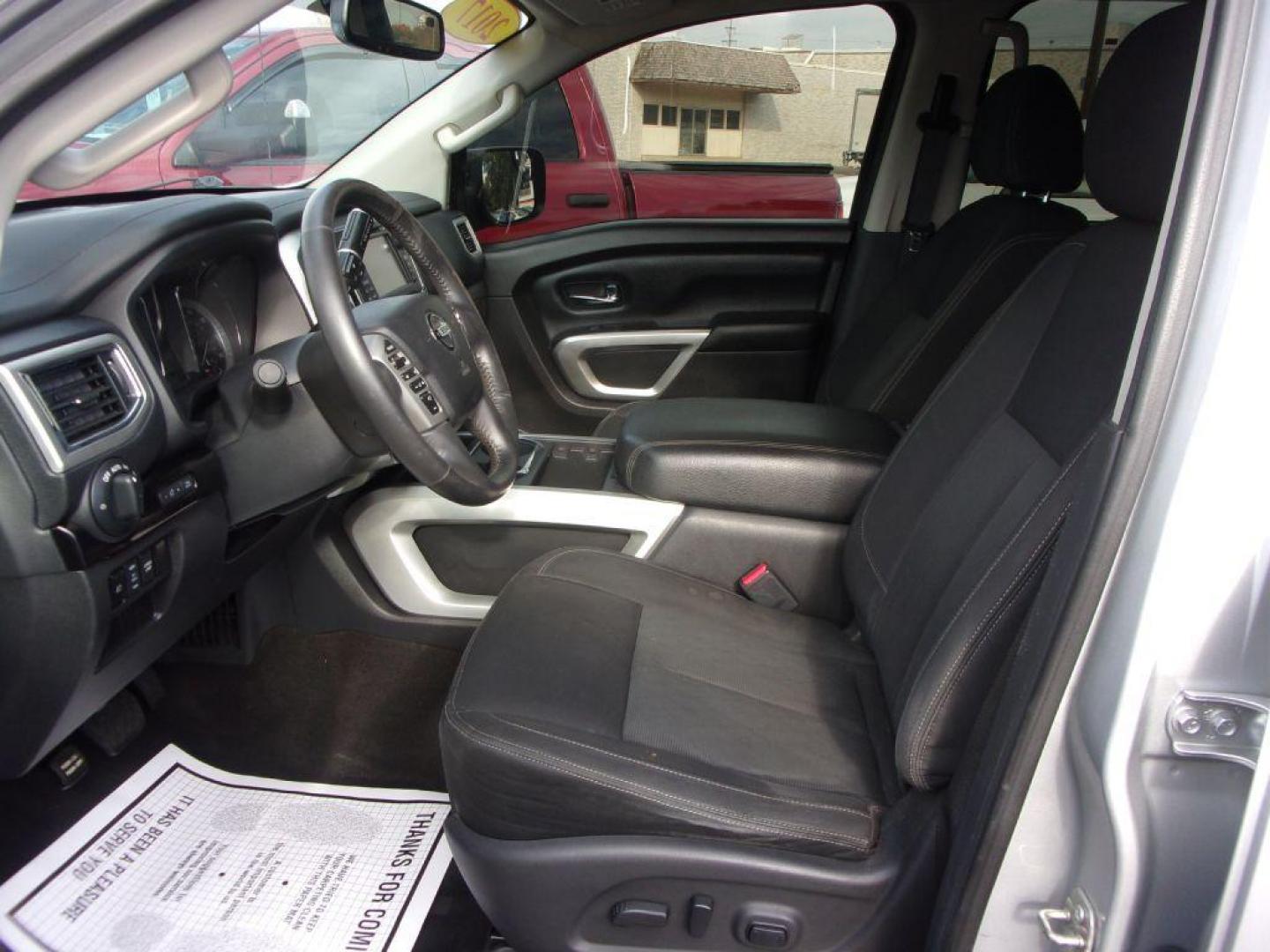 2017 SILVER NISSAN TITAN SV (1N6AA1E56HN) with an 5.6L engine, Automatic transmission, located at 501 E. Columbia St., Springfield, OH, 45503, (800) 262-7122, 39.925262, -83.801796 - *** 5.6L V8 4x4 *** Back Up Camera *** New AT Tires *** Heated Seats *** Tow *** Crew Cab *** Navigation w/ Premium Audio *** Parking Sensors *** Power Slide Rear Window *** Blind Spot *** Serviced and Detailed *** Jay North Auto has offered hand picked vehicles since 1965! Our customer's enjoy - Photo#10