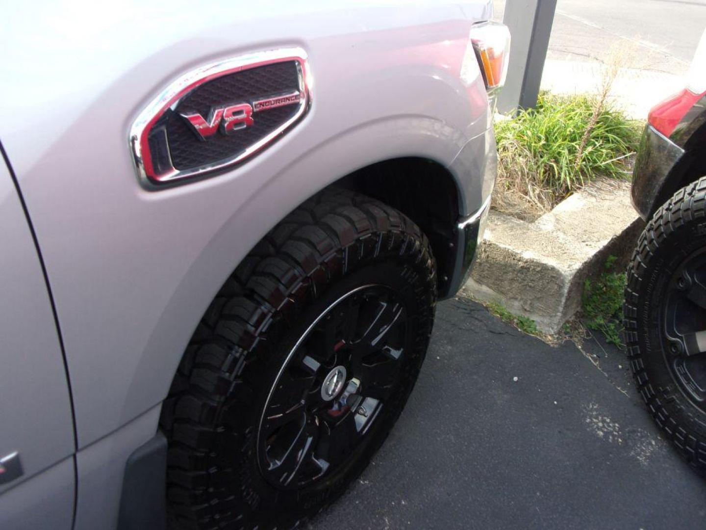 2017 SILVER NISSAN TITAN SV (1N6AA1E56HN) with an 5.6L engine, Automatic transmission, located at 501 E. Columbia St., Springfield, OH, 45503, (800) 262-7122, 39.925262, -83.801796 - *** 5.6L V8 4x4 *** Back Up Camera *** New AT Tires *** Heated Seats *** Tow *** Crew Cab *** Navigation w/ Premium Audio *** Parking Sensors *** Power Slide Rear Window *** Blind Spot *** Serviced and Detailed *** Jay North Auto has offered hand picked vehicles since 1965! Our customer's enjoy - Photo#13